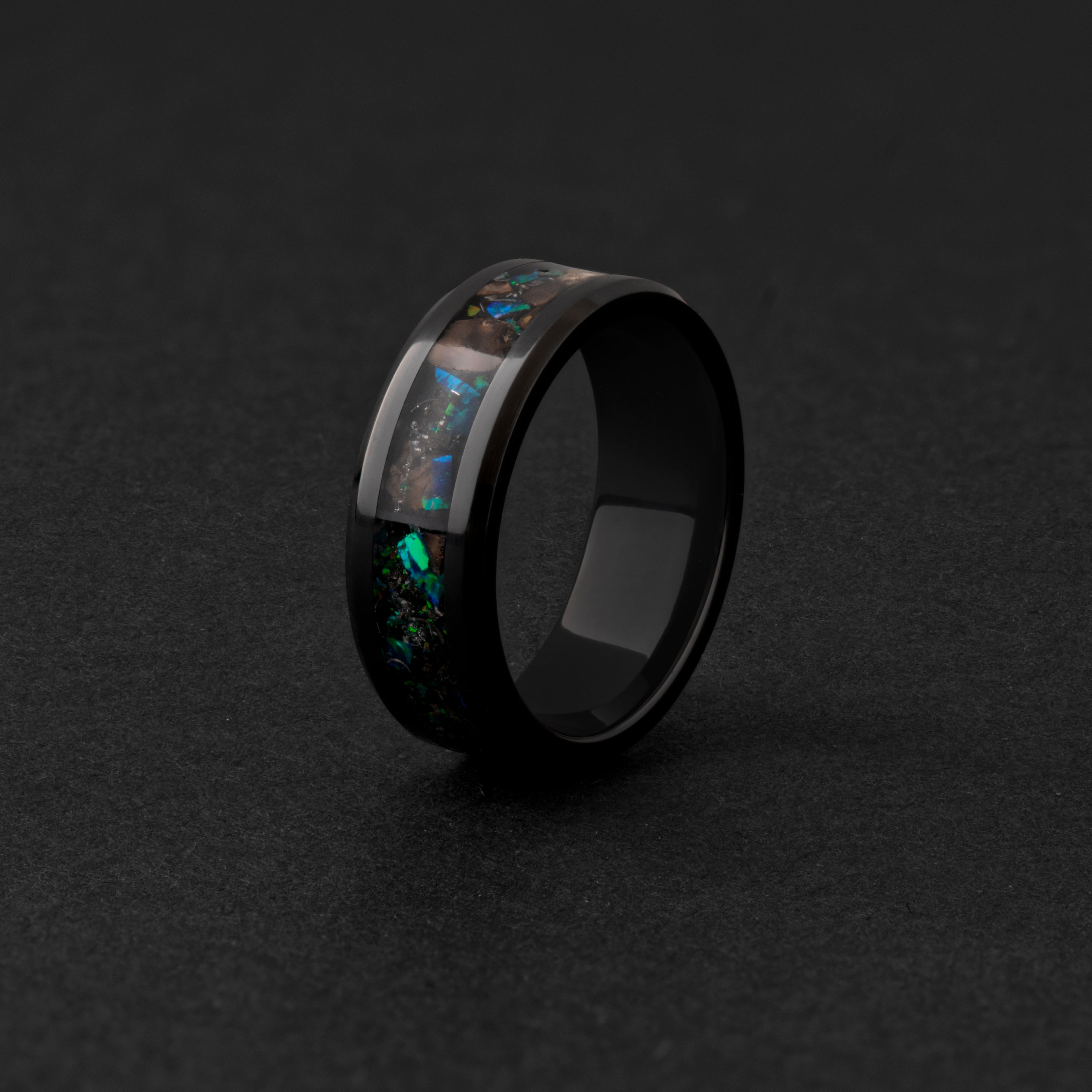 8mm beveled black ceramic ring with authentic T-Rex bone and Campo del Cielo meteorite in green opal inlay