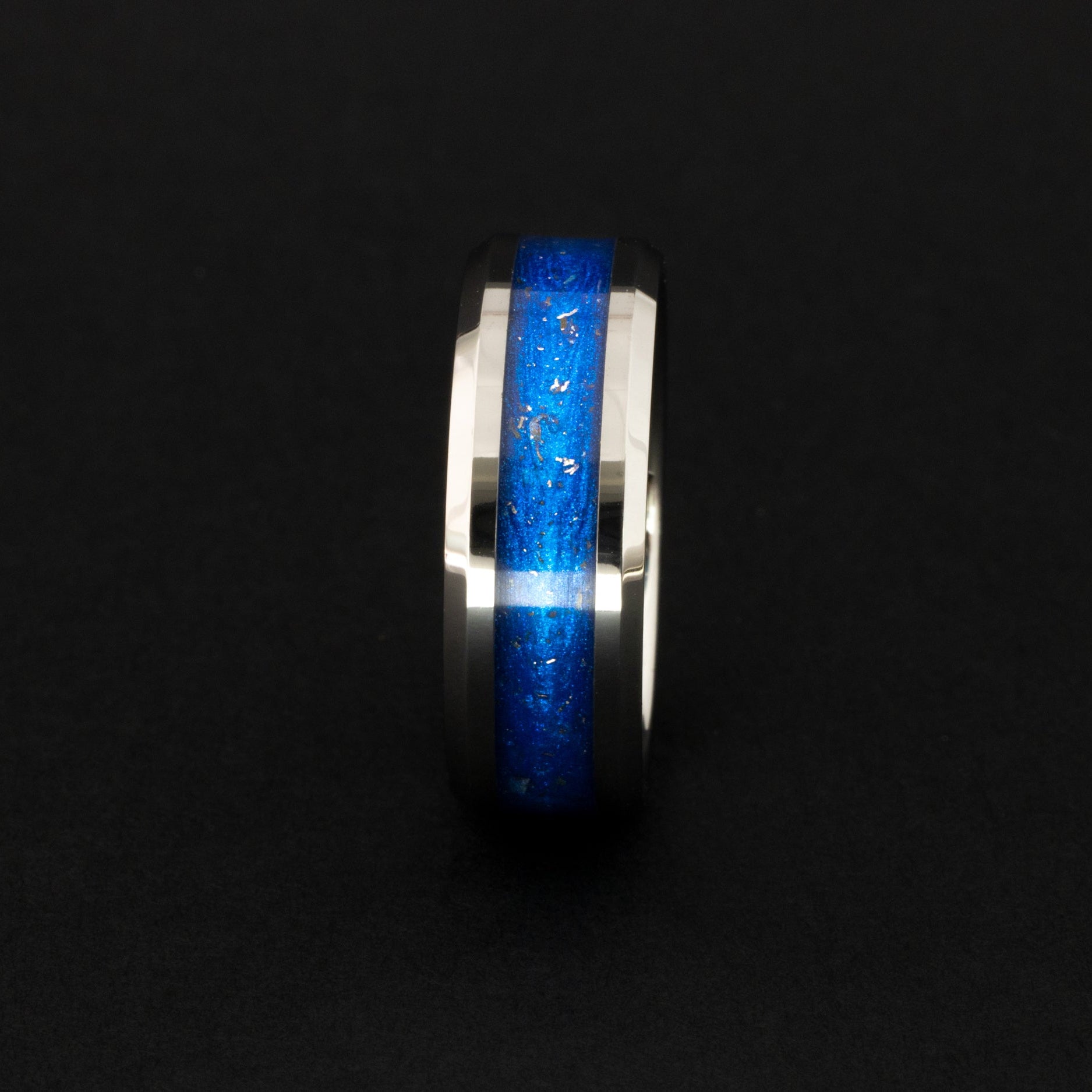 8mm tungsten wedding band featuring celestial meteorite fragments and blue inlay.