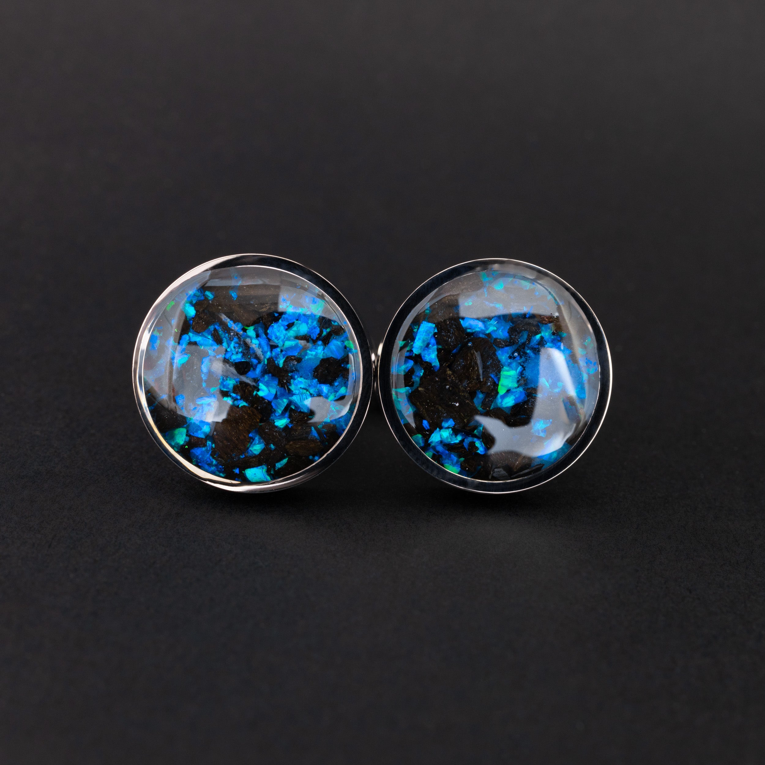 Close-up of the Blue Megalodon Cufflinks showing real megalodon shark tooth and vivid blue opal set in polished silver-tone stainless steel