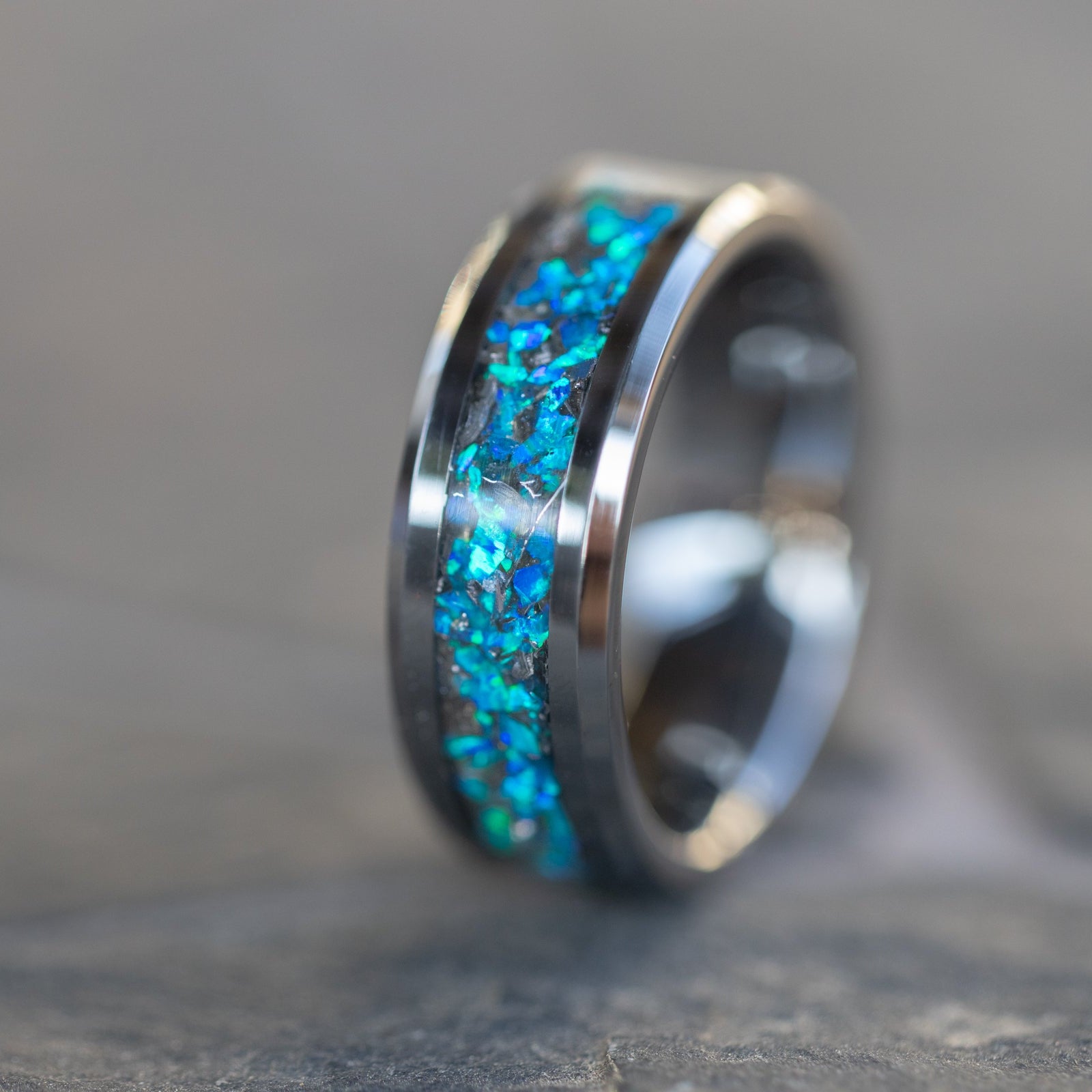 8mm beveled tungsten ring with authentic Campo del Cielo meteorite shavings suspended in blue opal inlay