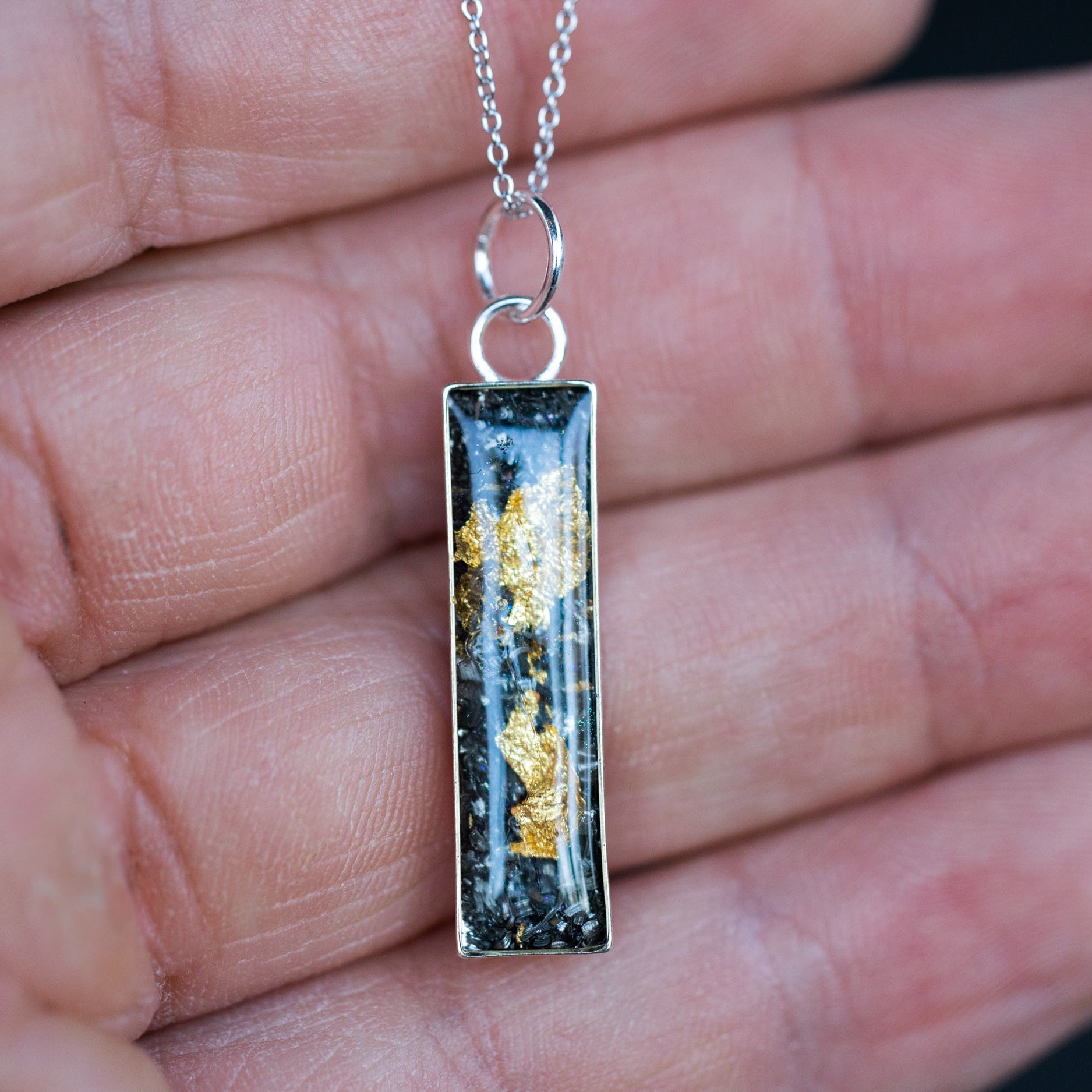 Handcrafted mixed metal bar pendant necklace in sterling silver with Campo Del Cielo meteorite and real 24K gold flake inlay
