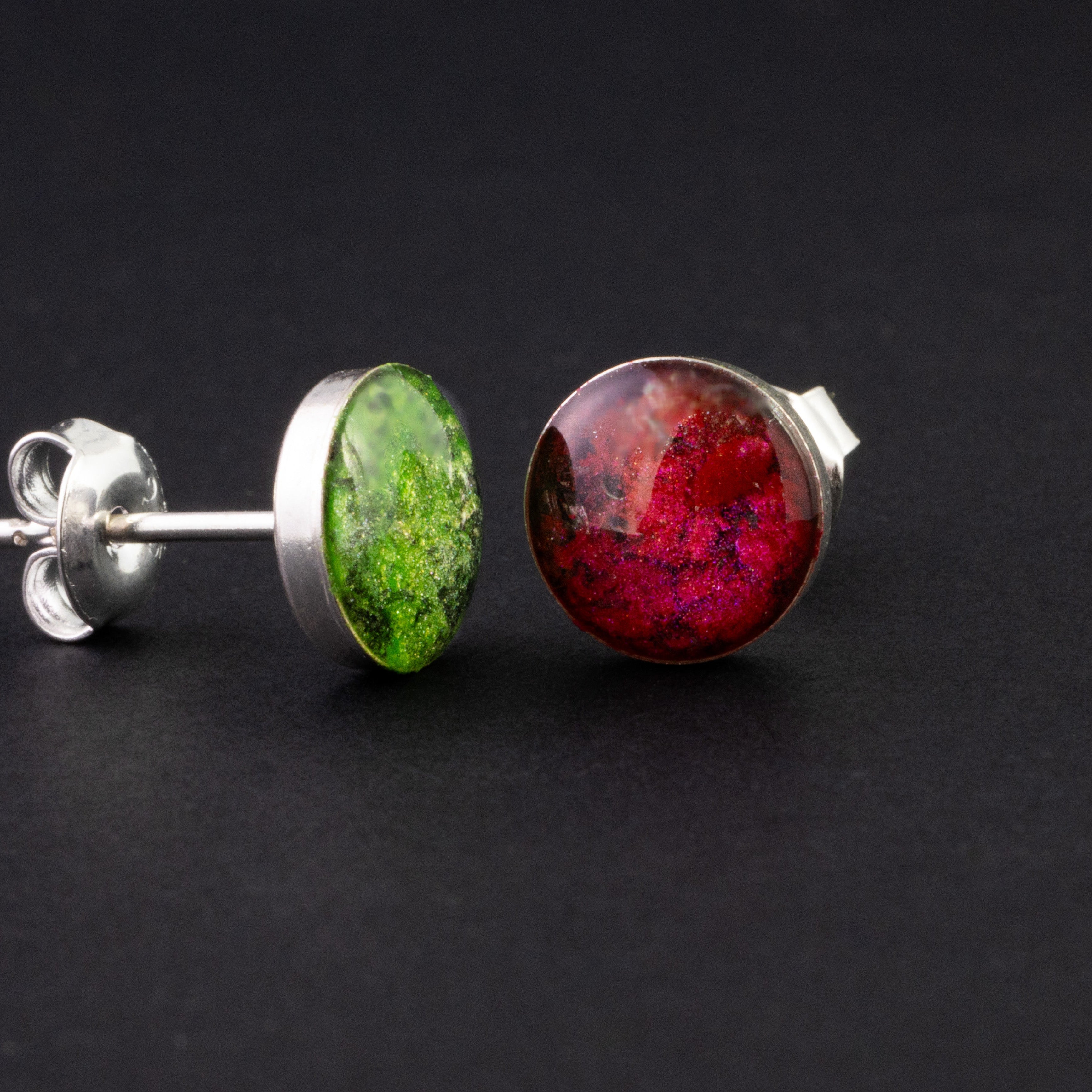 Handcrafted holiday silver stud earrings in sterling silver with Campo Del Cielo meteorite and red and green resin inlay