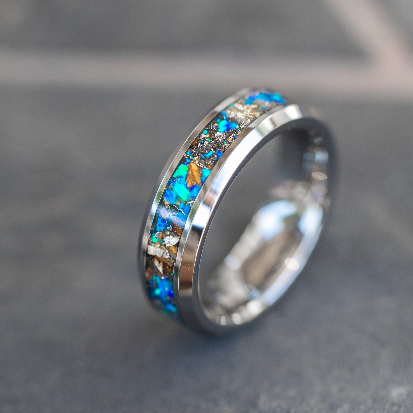 6mm beveled tungsten ring with authentic Tyrannosaurus Rex bone and Campo del Cielo meteorite in blue opal inlay