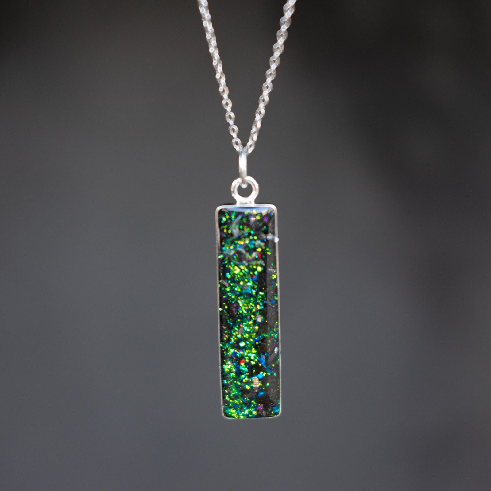 Deep Sea Megalodon authentic silver bar pendant necklace with Campo Del Cielo meteorite, real megalodon tooth, and blue and green opal inlay