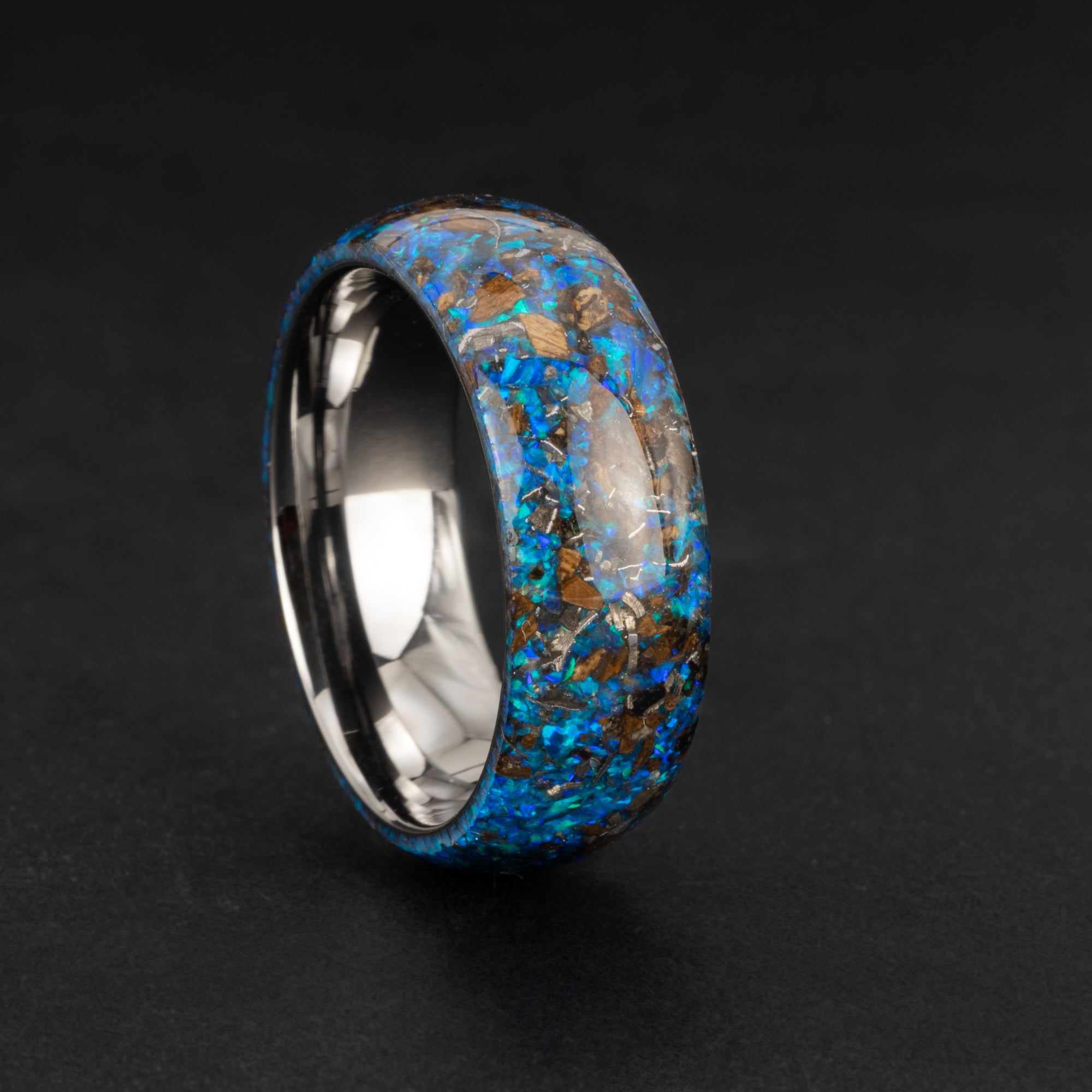 Endless Blue Rex 8mm endless tungsten mens wedding band with Campo Del Cielo meteorite, real T-Rex fossil bone, and vivid blue opal inlay
