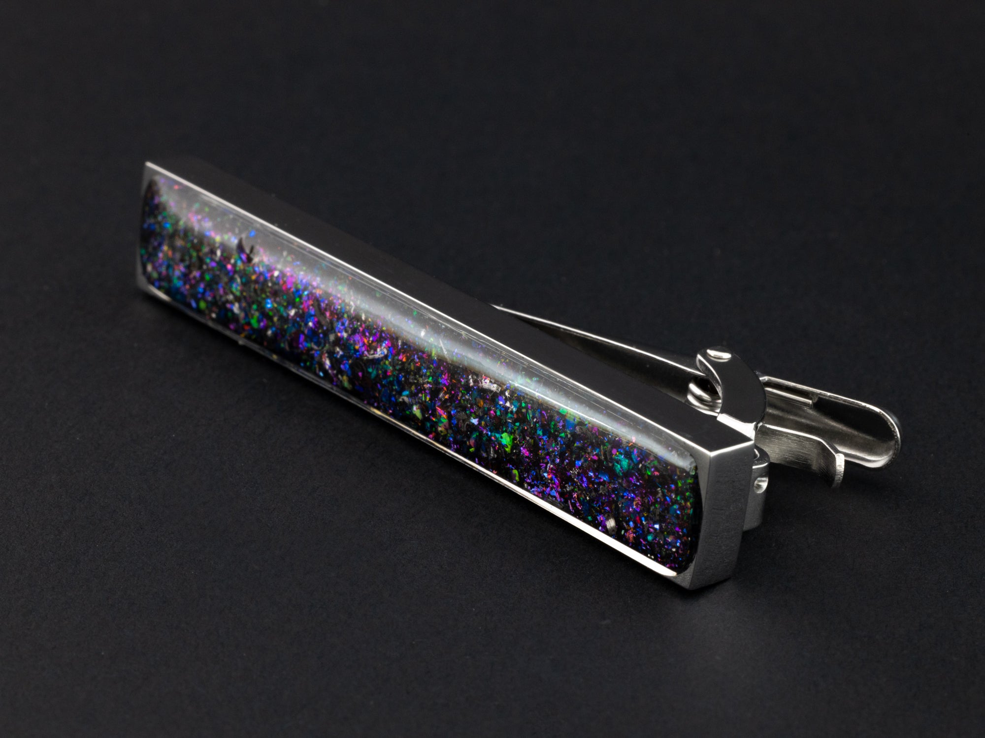 Handcrafted galaxy silver-tone stainless steel mens tie clip with Campo Del Cielo meteorite, multicolor opals, and pigment glitter inlay, ideal as wedding or groomsmen tie clip