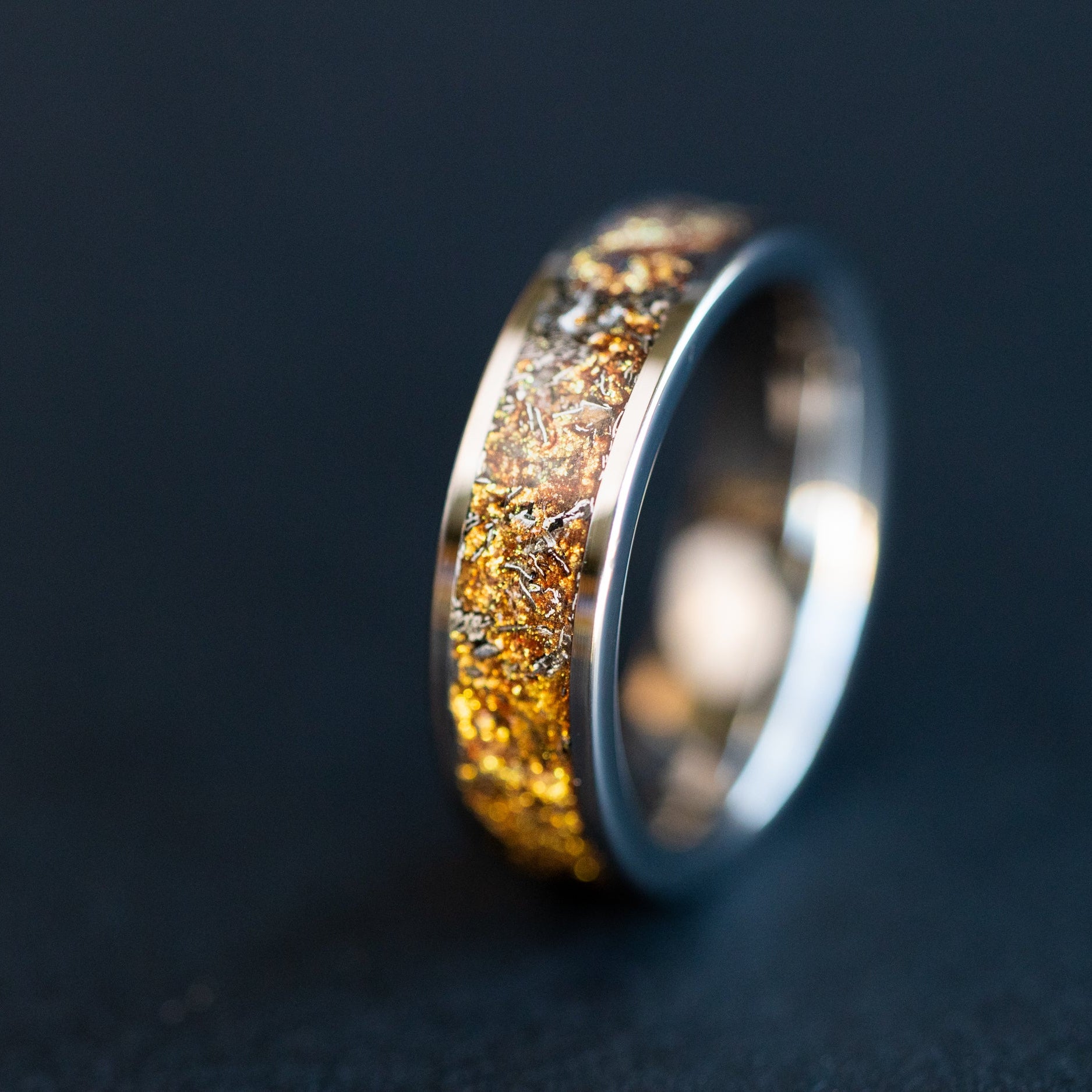 6mm wide channel tungsten ring with authentic Campo del Cielo meteorite shavings suspended in gold galaxy pigment inlay