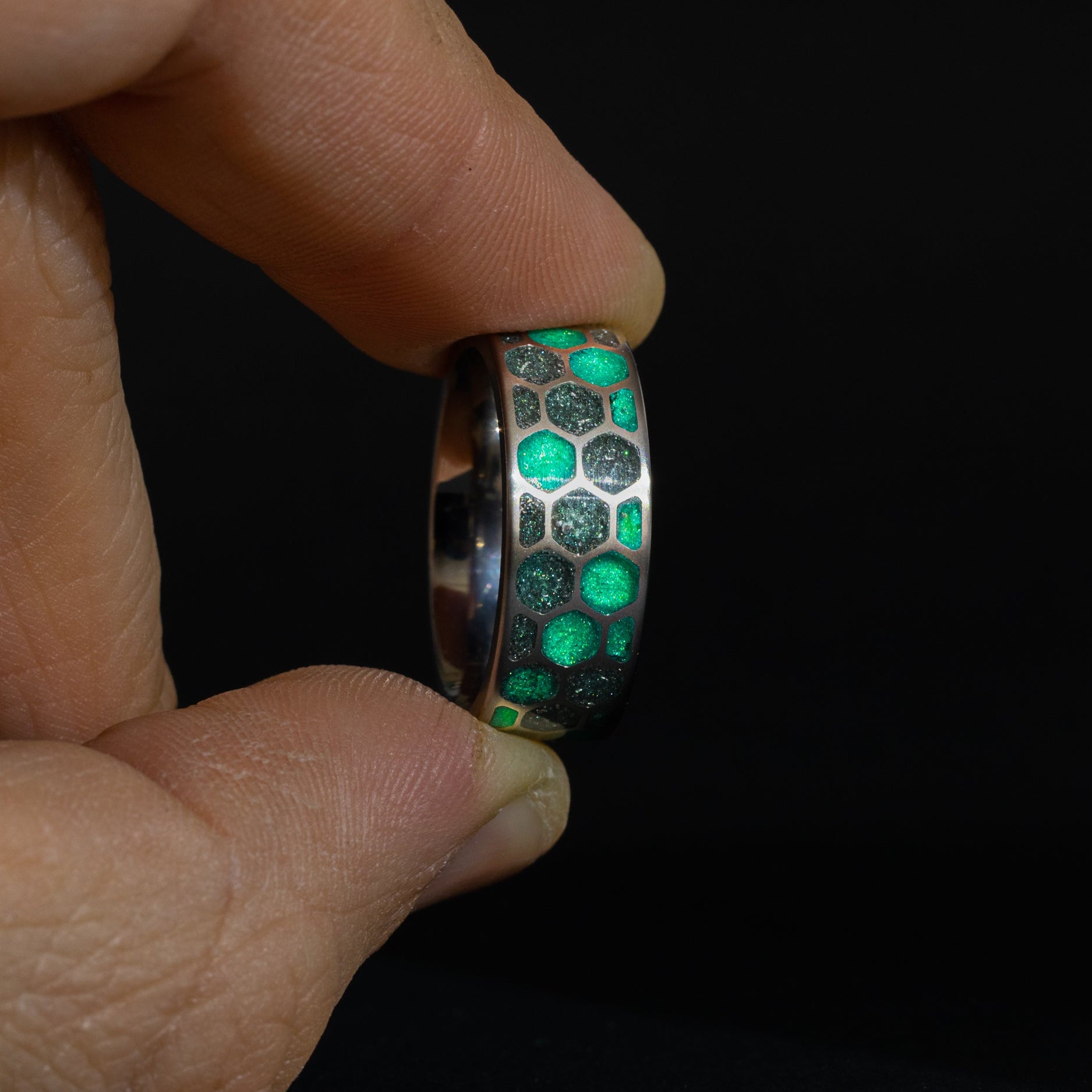 Green Hive Glow ring lighting up green in the dark, illuminating every honeycomb cell.