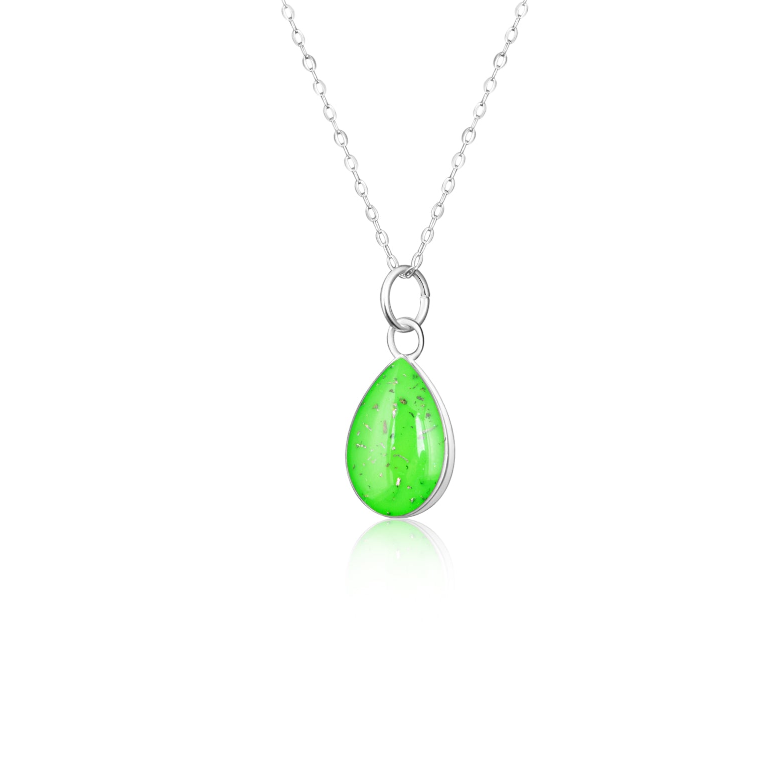 Close-up of the Lime Comet pendant showing authentic Campo Del Cielo meteorite fragments set in lime green resin
