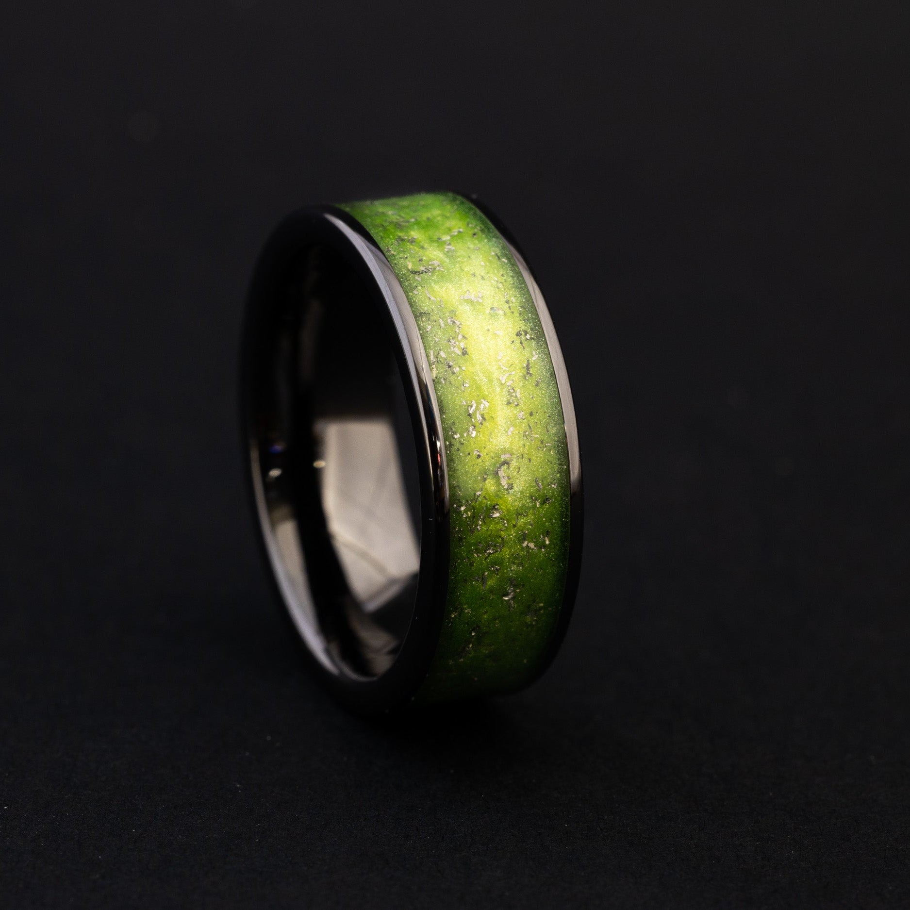 8mm ceramic wedding band featuring celestial meteorite fragments and neon green inlay.