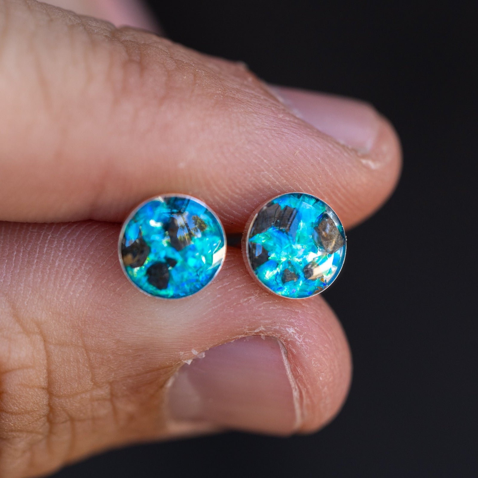 Handcrafted lunar meteorite and blue opal stud earrings in sterling silver with real Moon rock and vivid blue opal inlay