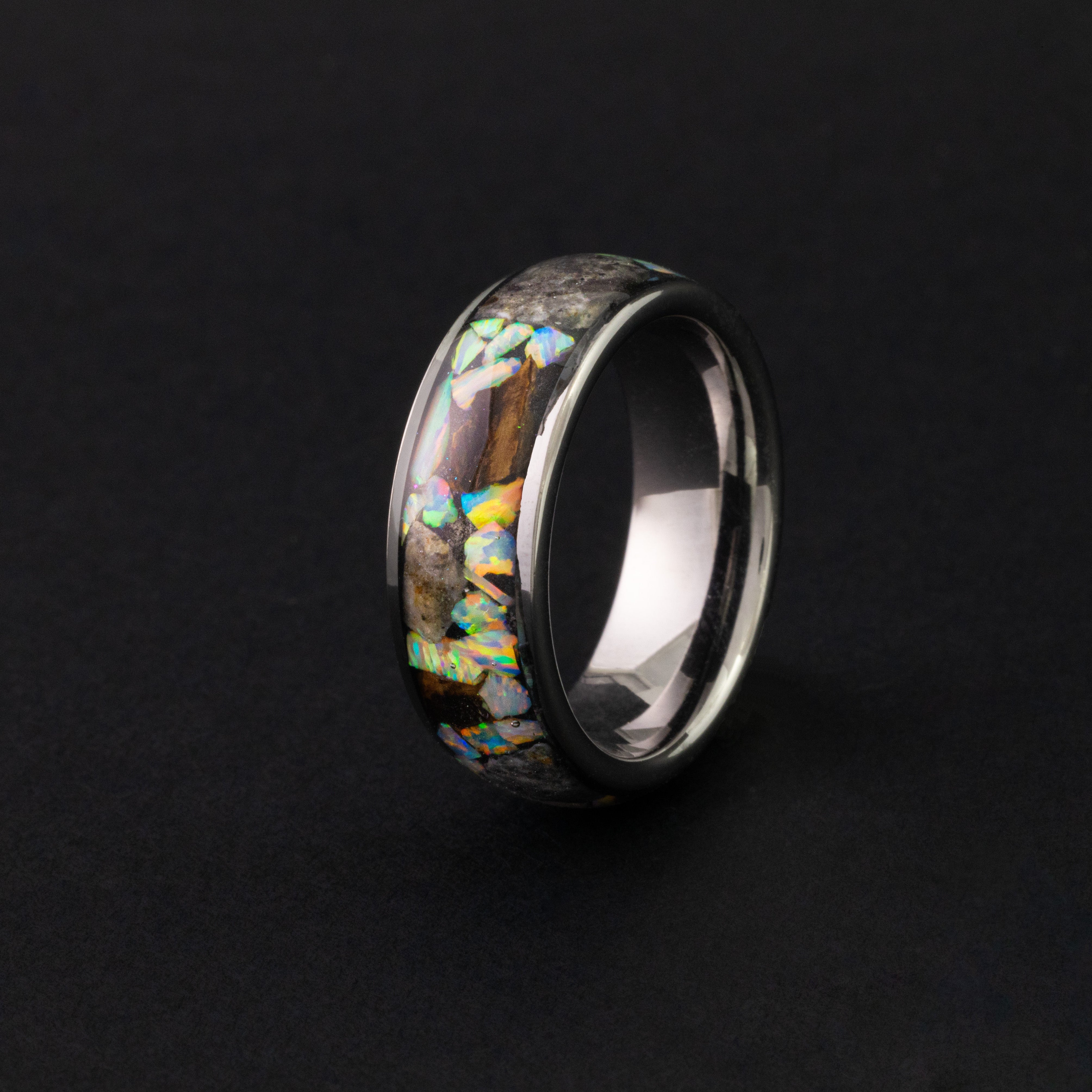 8mm wide channel tungsten ring with large pieces of authentic T-Rex bone and lunar meteorite in white pearl opal inlay