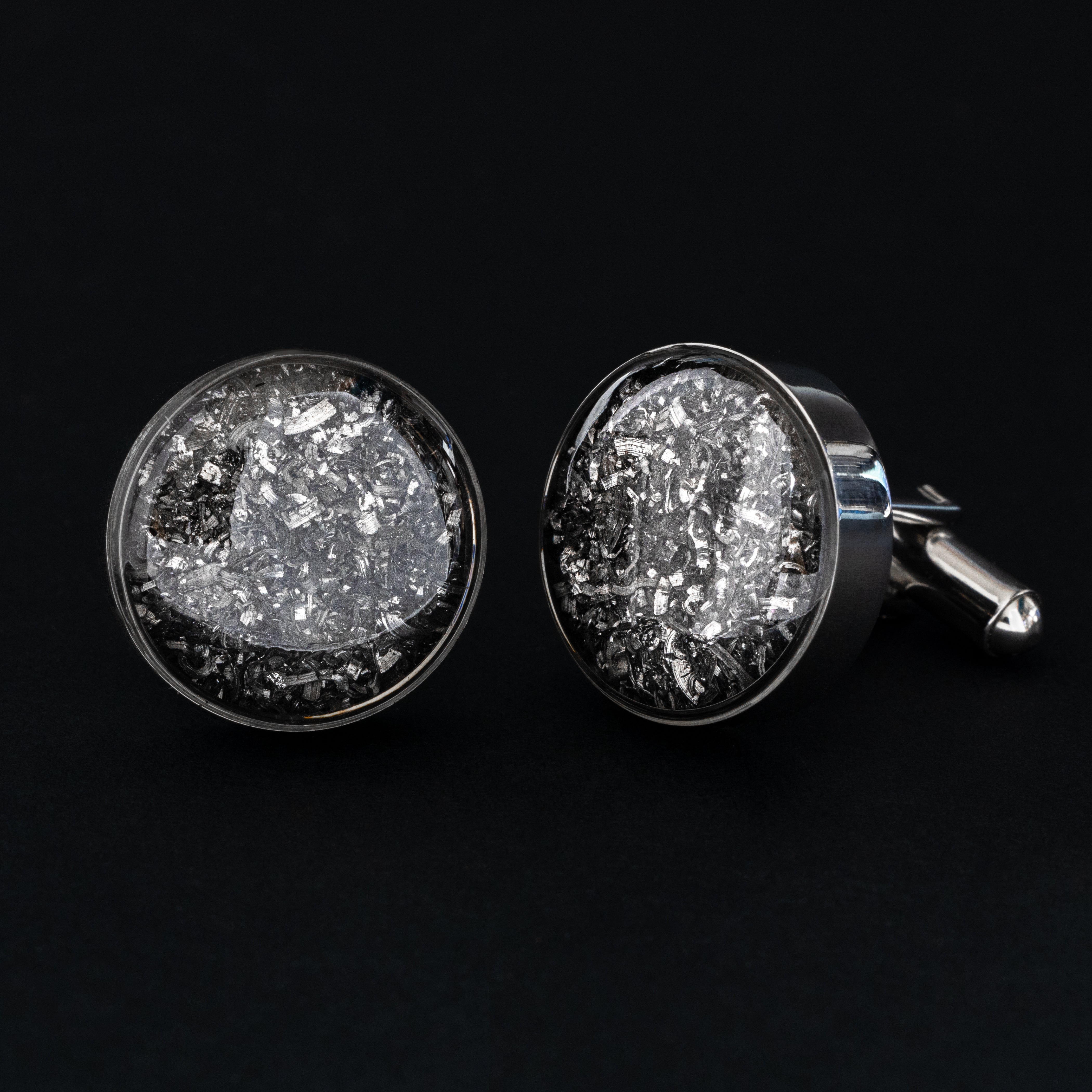 Close-up of the Meteorite Cufflinks showing real Campo Del Cielo iron meteorite set in polished silver-tone stainless steel