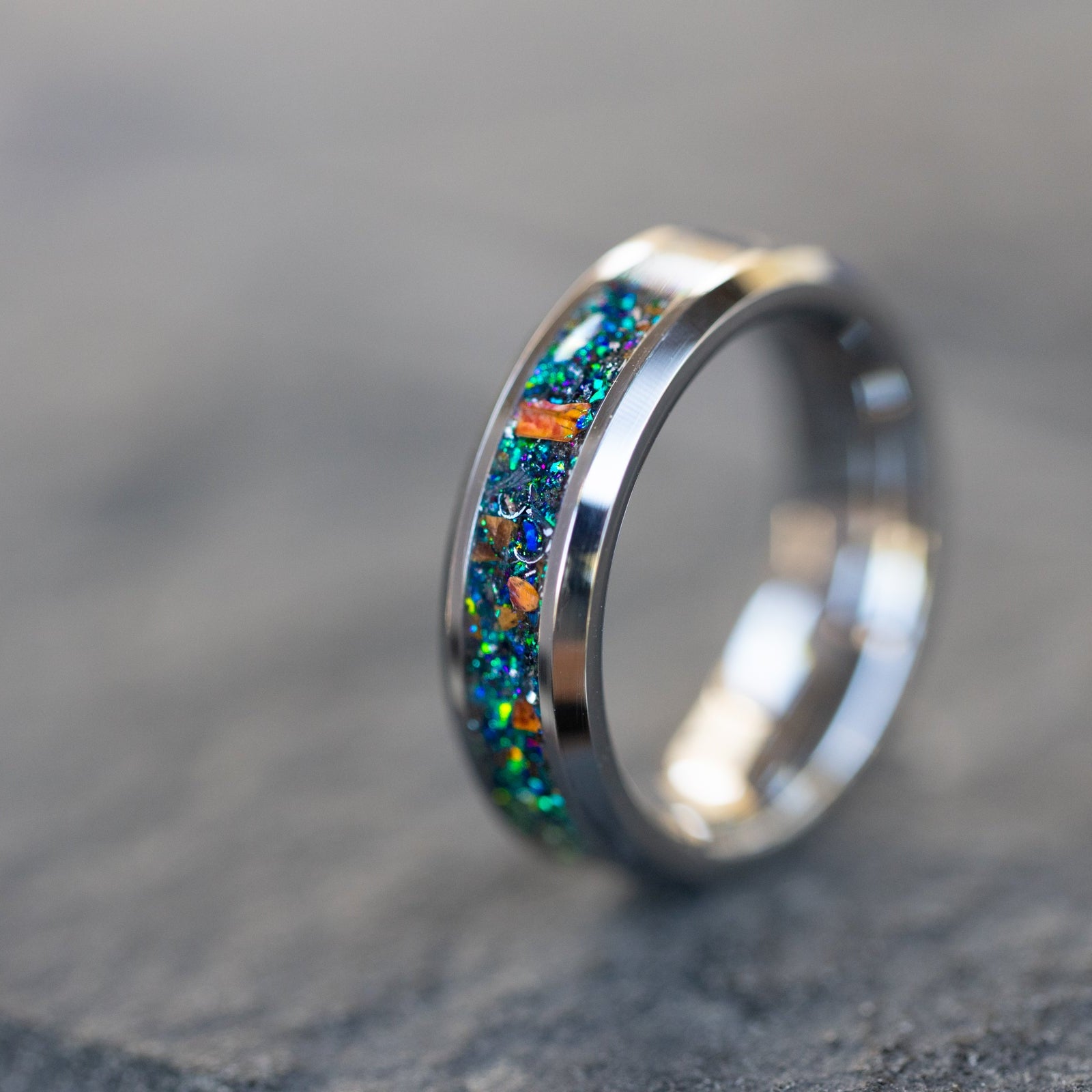 6mm beveled tungsten ring with authentic Velociraptor bone and Campo del Cielo meteorite in multi-color blue green opal galaxy inlay