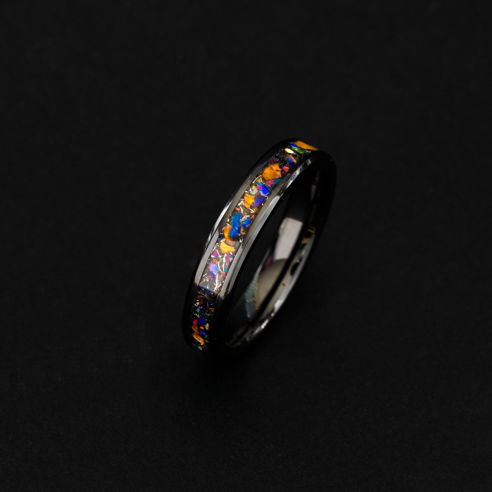4mm ceramic wedding band featuring prehistoric raptor bone and purple opal.