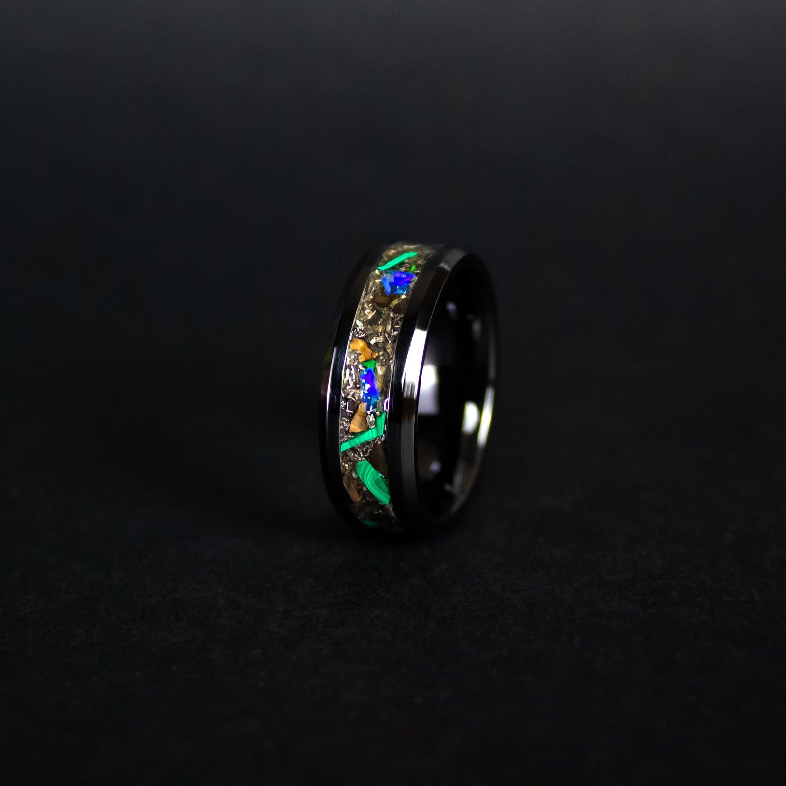 8mm beveled black ceramic ring with authentic T-Rex bone, Campo del Cielo meteorite, malachite, and Ethiopian Opal inlay