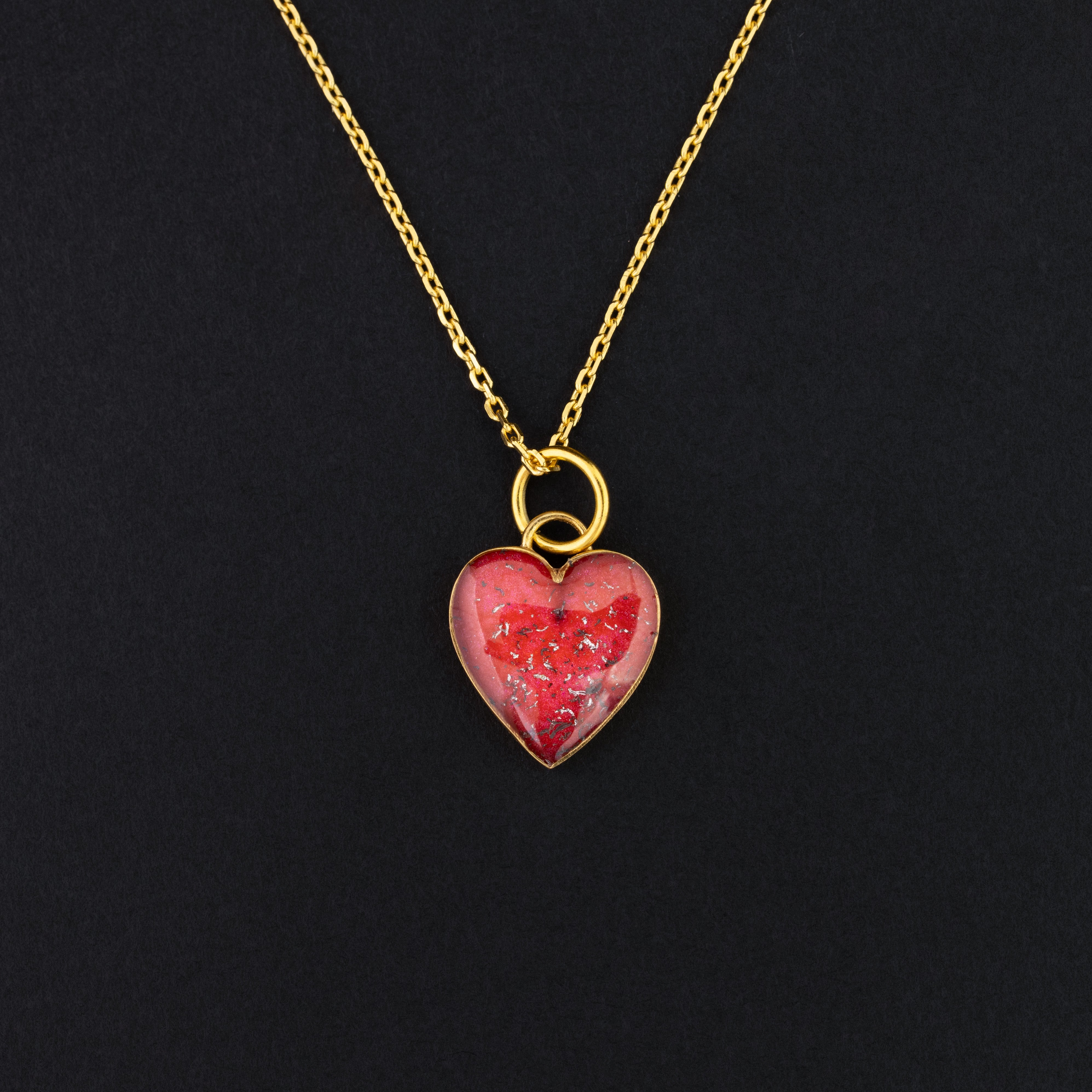 Ruby Pulse gold heart pendant necklace with Campo Del Cielo meteorite and red resin inlay