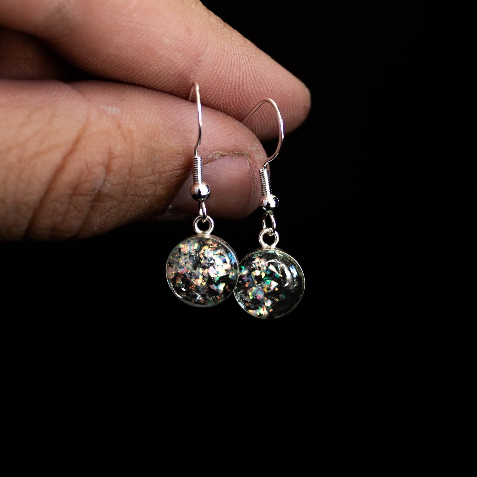 Handcrafted iridescent white opal silver dangle earrings in sterling silver with Campo Del Cielo meteorite and white opal inlay