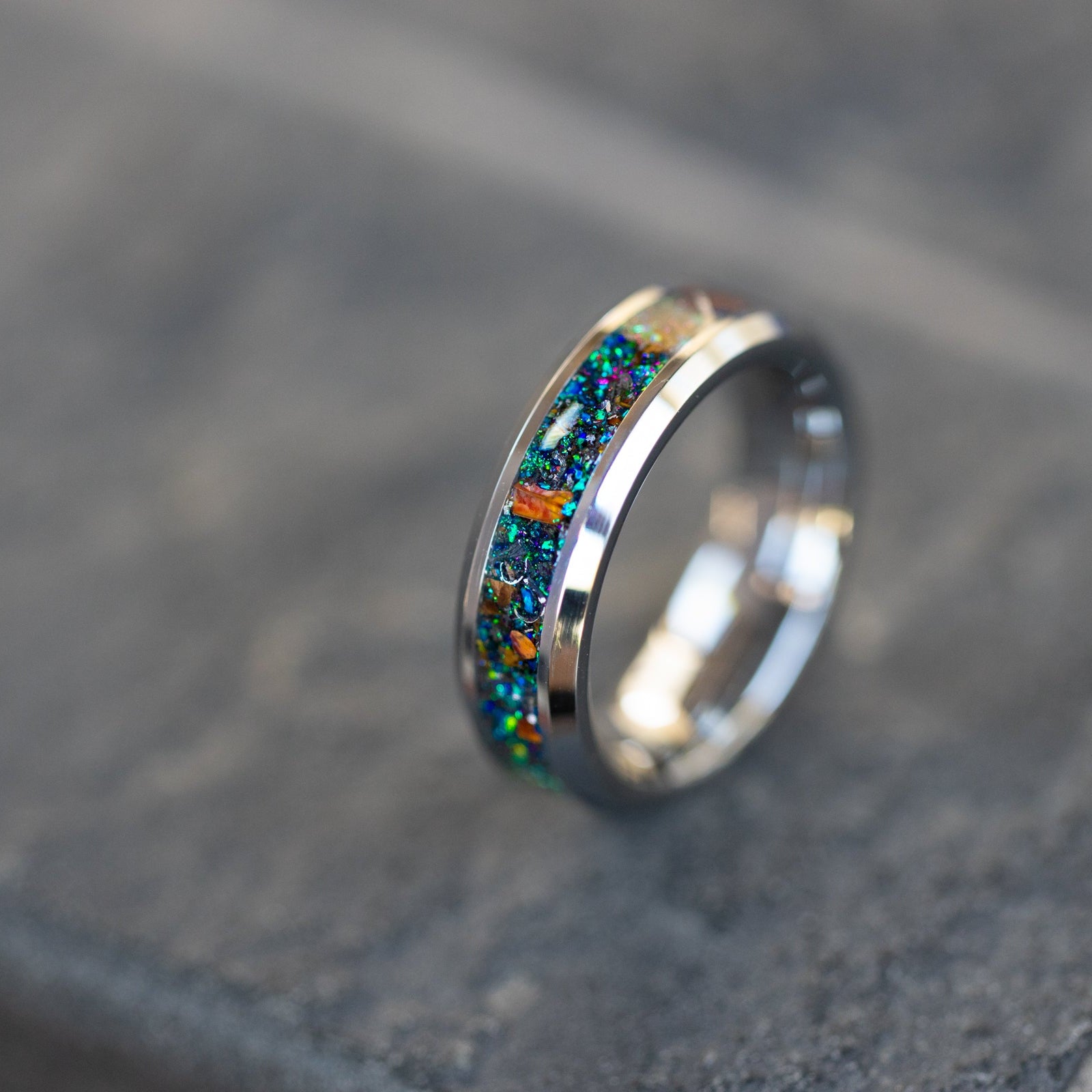 Handcrafted 6mm beveled tungsten mens wedding band with authentic Velociraptor bone and Campo del Cielo meteorite in prismatic multi-color galaxy inlay made in California