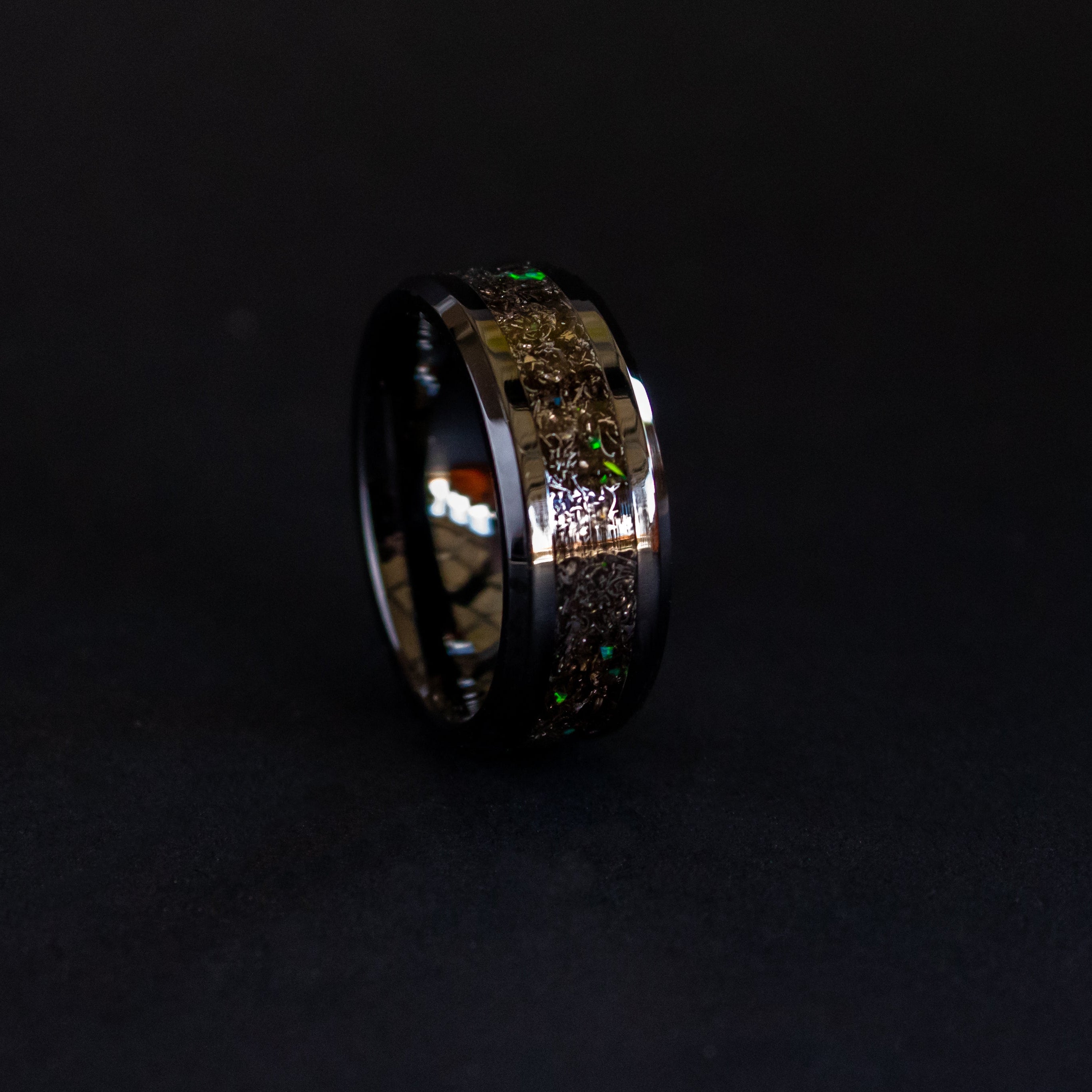 Handcrafted 8mm beveled black ceramic mens wedding band with authentic Gibeon meteorite and green opal accents made in California