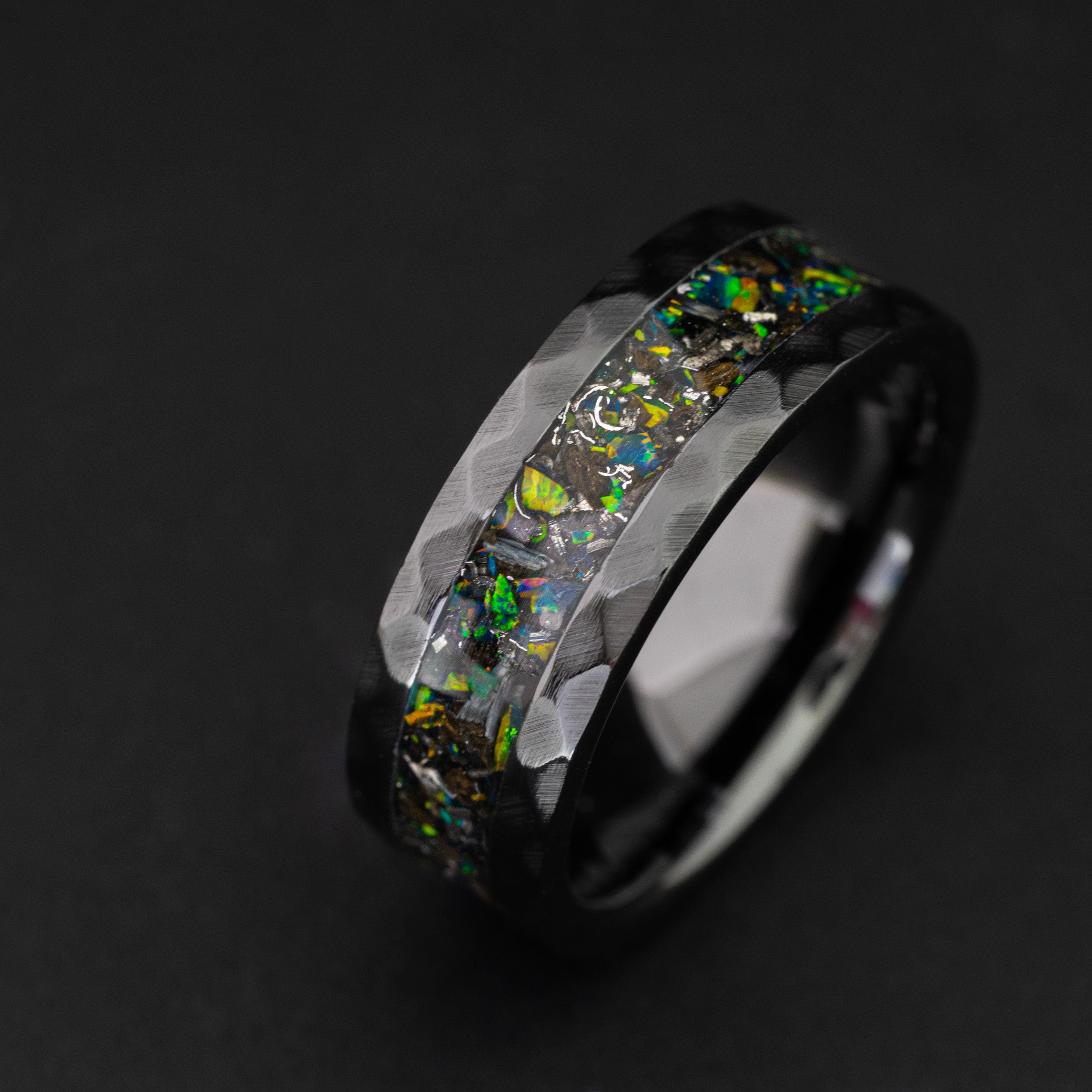 8mm hammered black ceramic ring featuring authentic meteorite and vibrant green opals.
