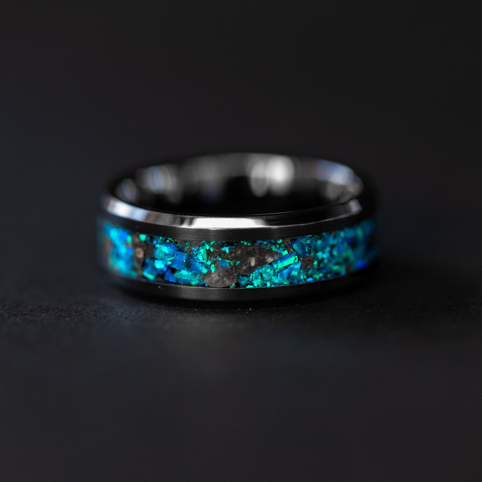 Handcrafted 8mm beveled black ceramic mens wedding band with authentic lunar meteorite in blue opal inlay made in California