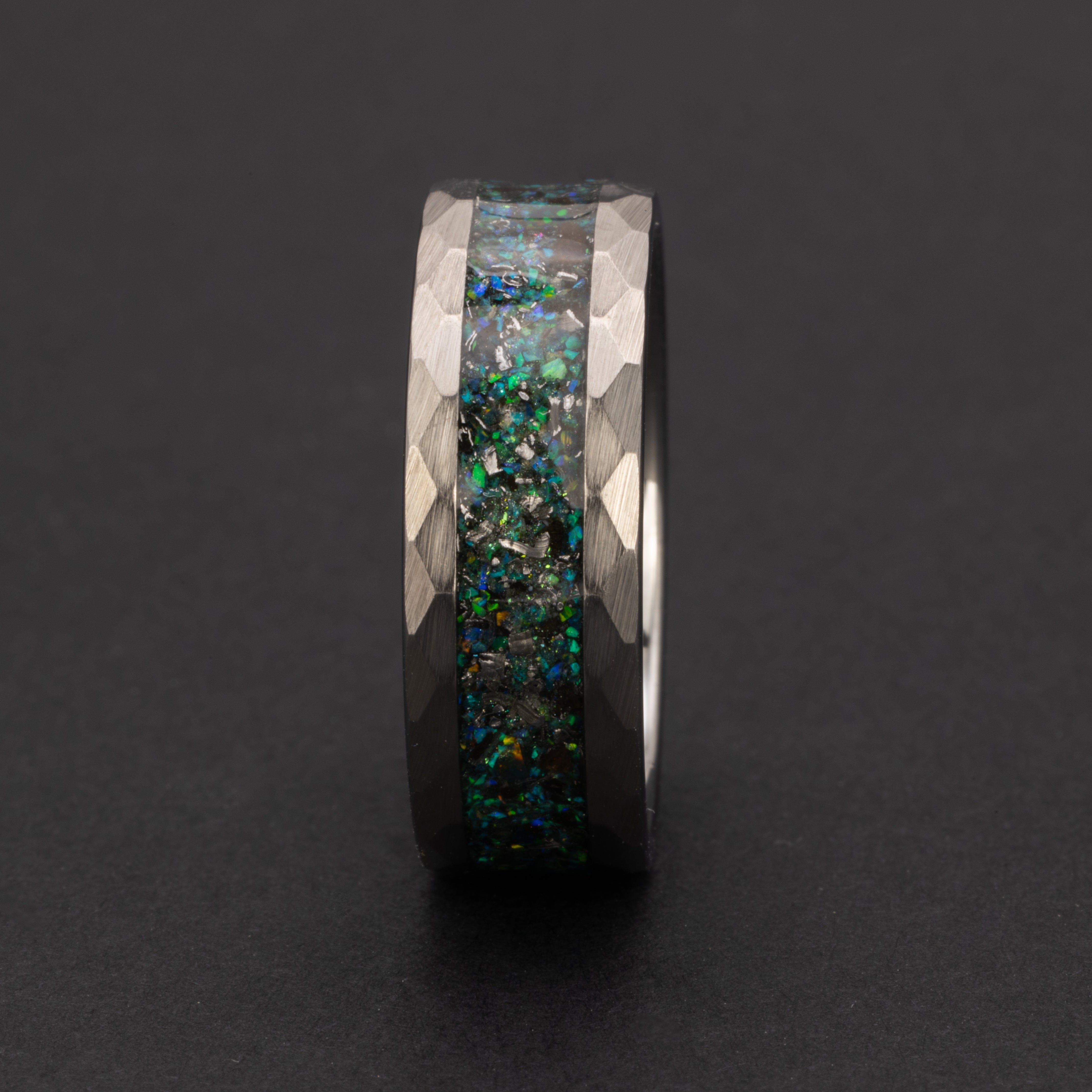 Handcrafted hammered tungsten mens wedding band with authentic Megalodon tooth and Campo del Cielo meteorite in blue green opal blue glow inlay made in California