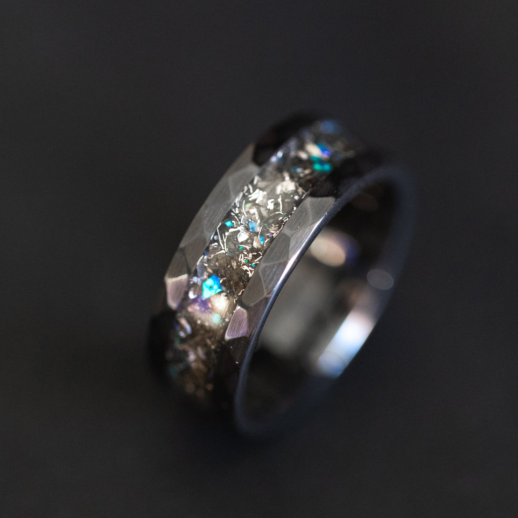 Handcrafted hammered black ceramic mens wedding band with authentic Campo del Cielo meteorite and blue opal accent inlay made in California