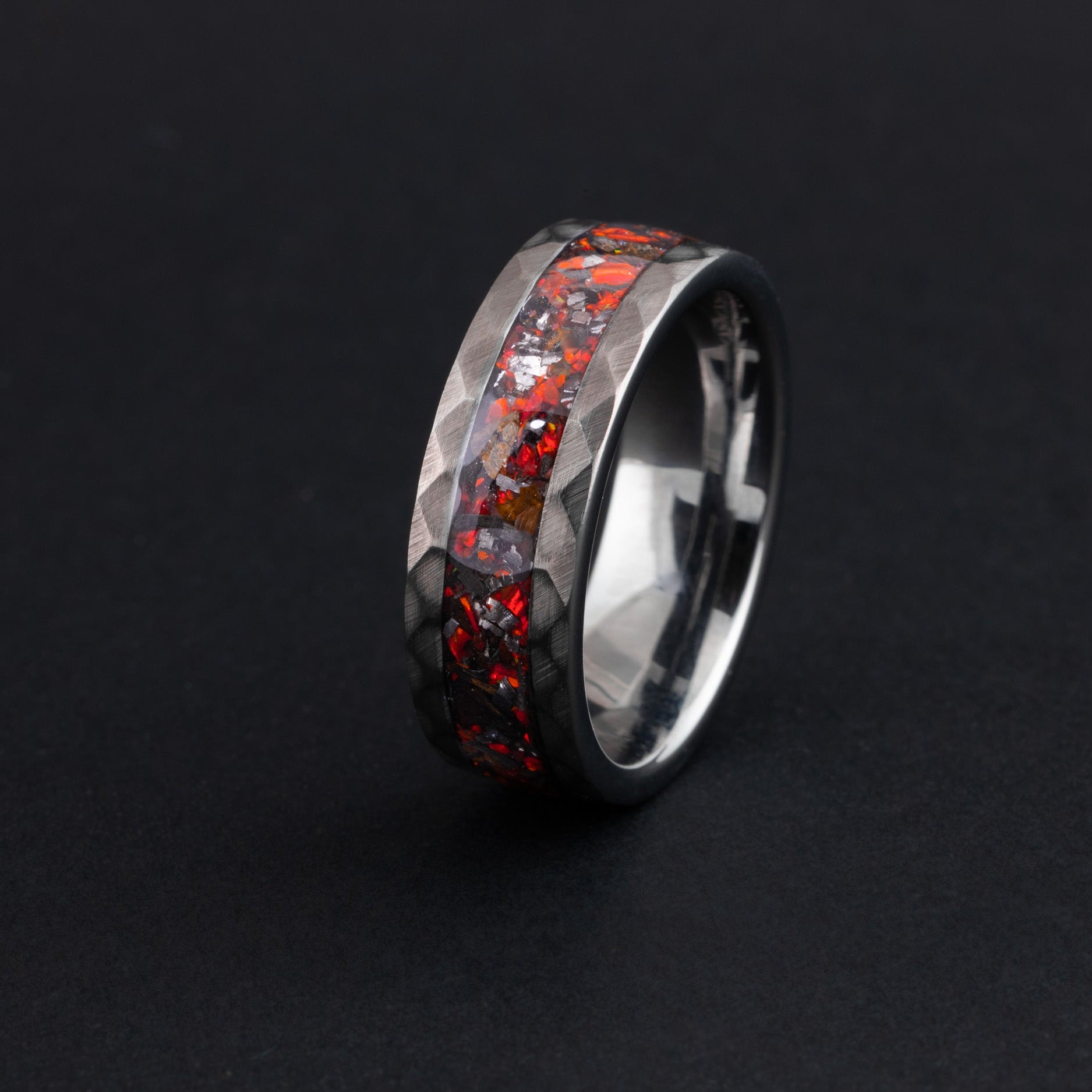 Handcrafted T-Rex bone and meteorite men's wedding band with red fire opal.