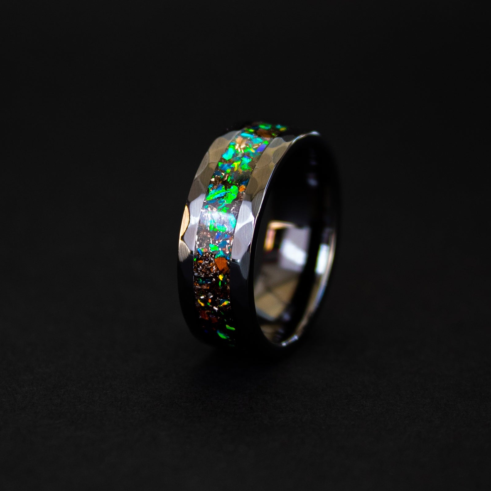 Hammered black ceramic ring with authentic T-Rex bone and Campo del Cielo meteorite in green opal inlay