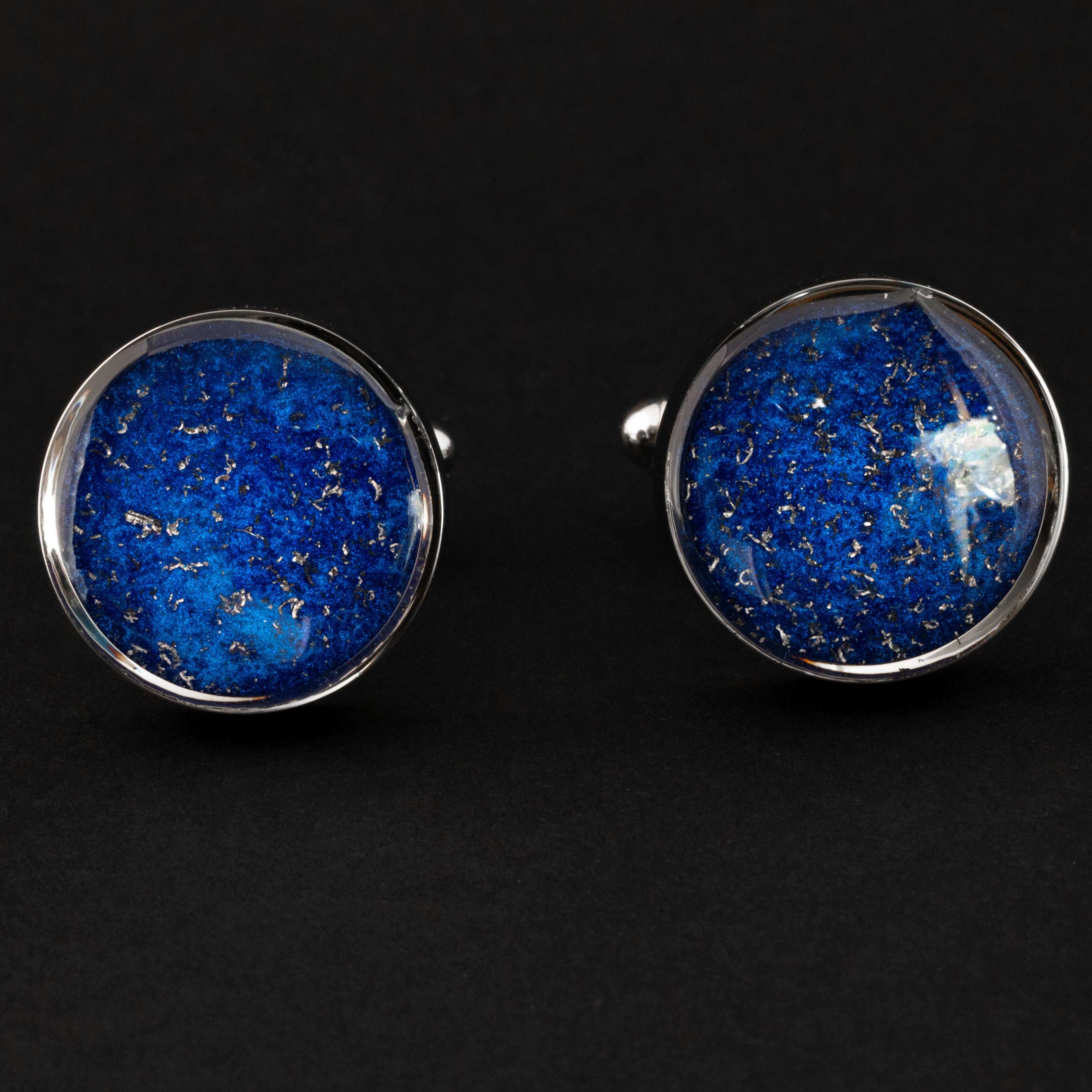 Close-up of the Blue Meteorite Cufflinks showing Campo Del Cielo iron meteorite set in deep cobalt blue resin in polished silver-tone stainless steel