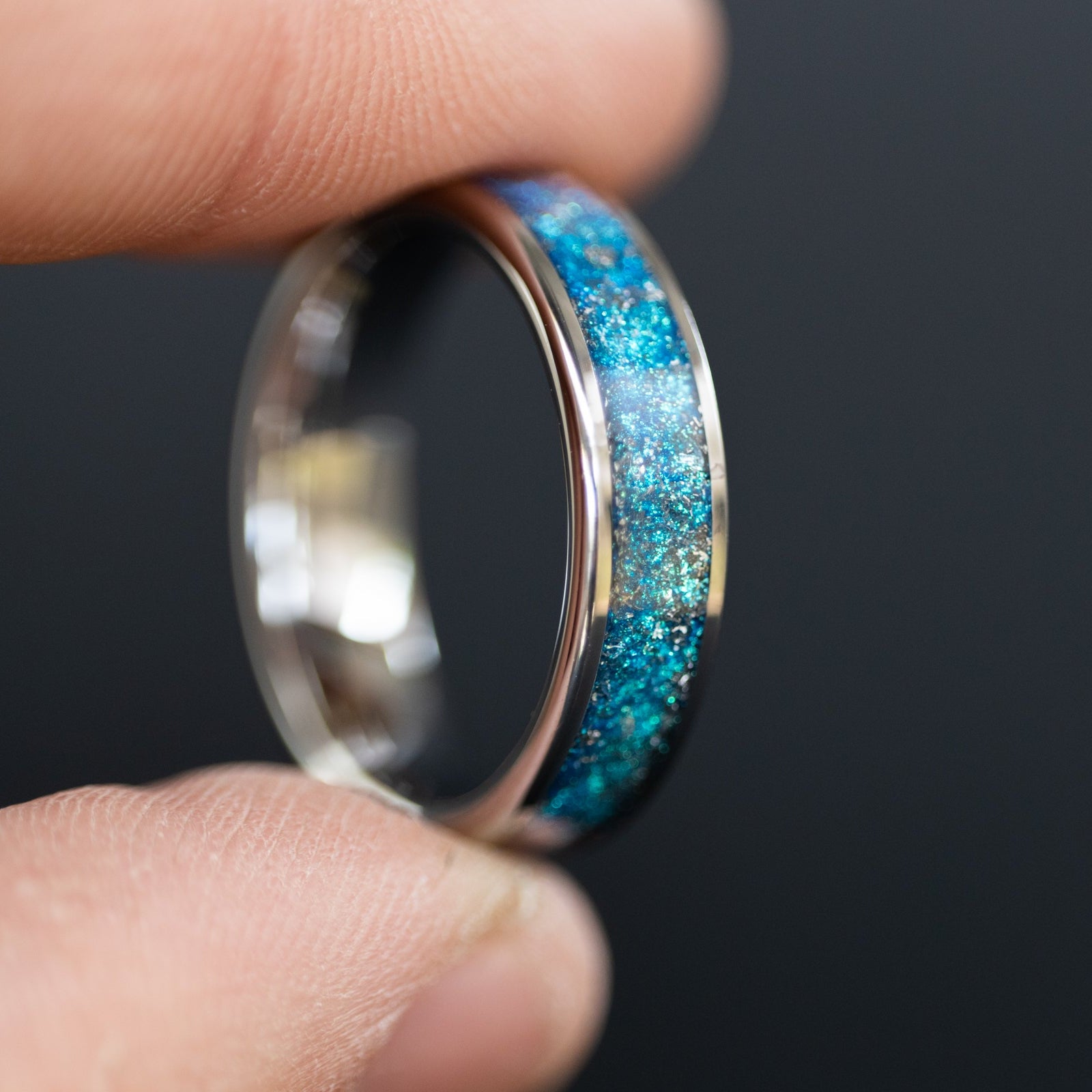6mm wide channel tungsten ring with authentic Campo del Cielo meteorite shavings suspended in blue glitter pigment inlay