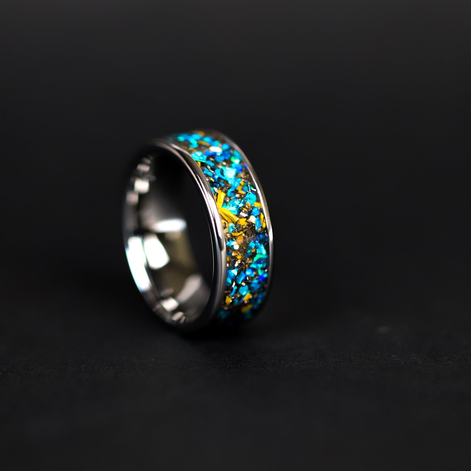 8mm wide channel tungsten ring with authentic Velociraptor bone and Campo del Cielo meteorite in blue opal inlay