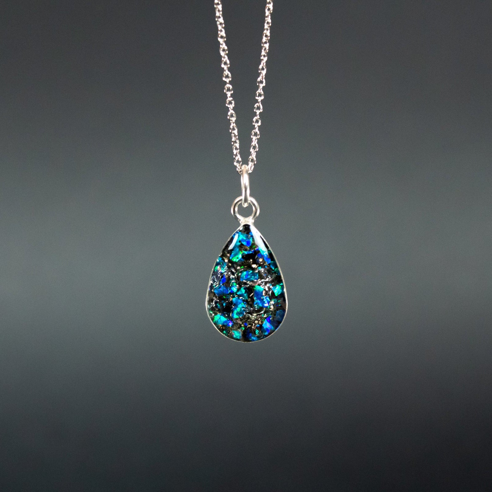 Comet Blue Drop authentic silver teardrop pendant necklace with Campo Del Cielo meteorite and vivid blue opal inlay