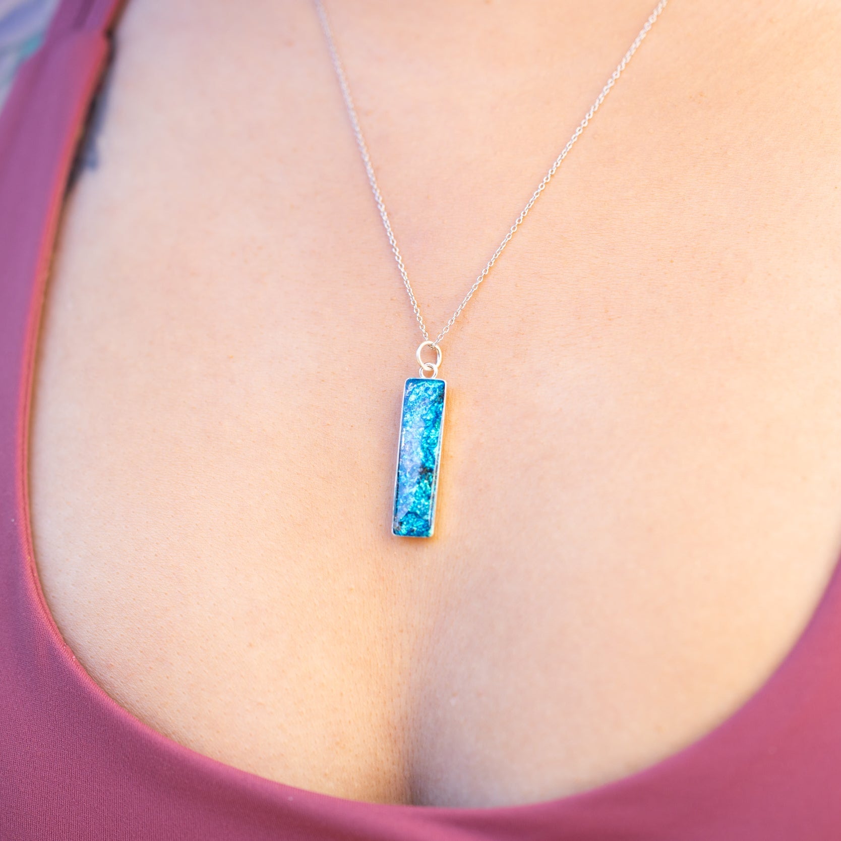 Comet Sky silver bar pendant necklace with Campo Del Cielo meteorite and blue glitter inlay shown on a chain, ideal as a galaxy, night sky, or astronomy gift necklace