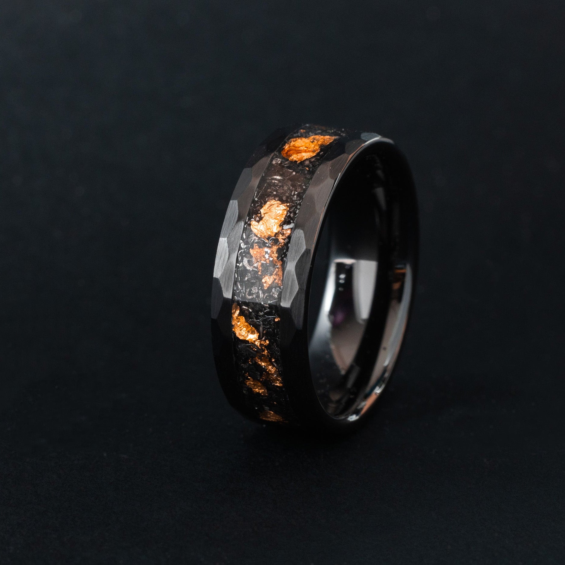 Hammered black ceramic ring with authentic Campo meteorite and warm copper flake inlay