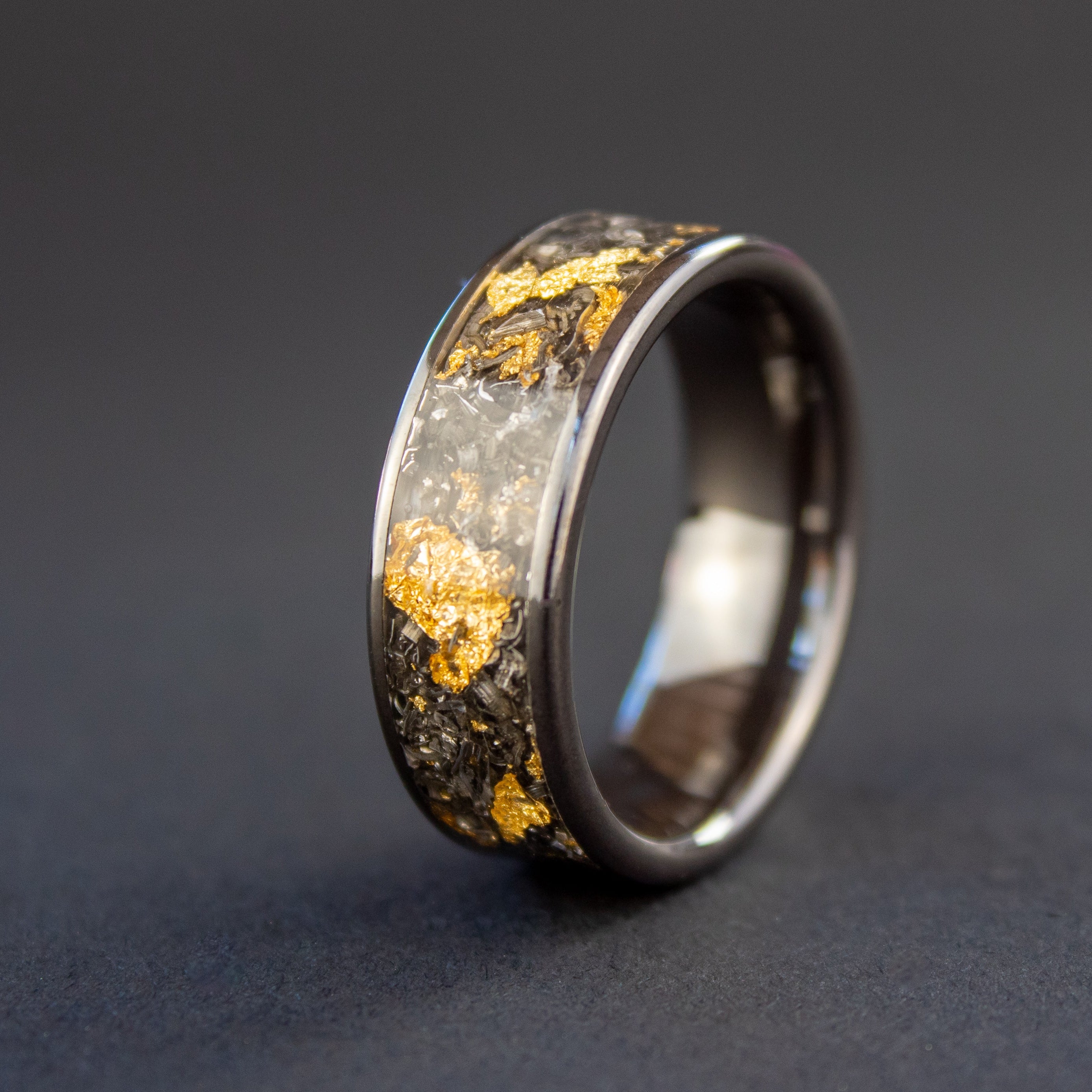 8mm wide channel black ceramic ring with authentic Campo del Cielo meteorite shavings and real gold metal flake inlay
