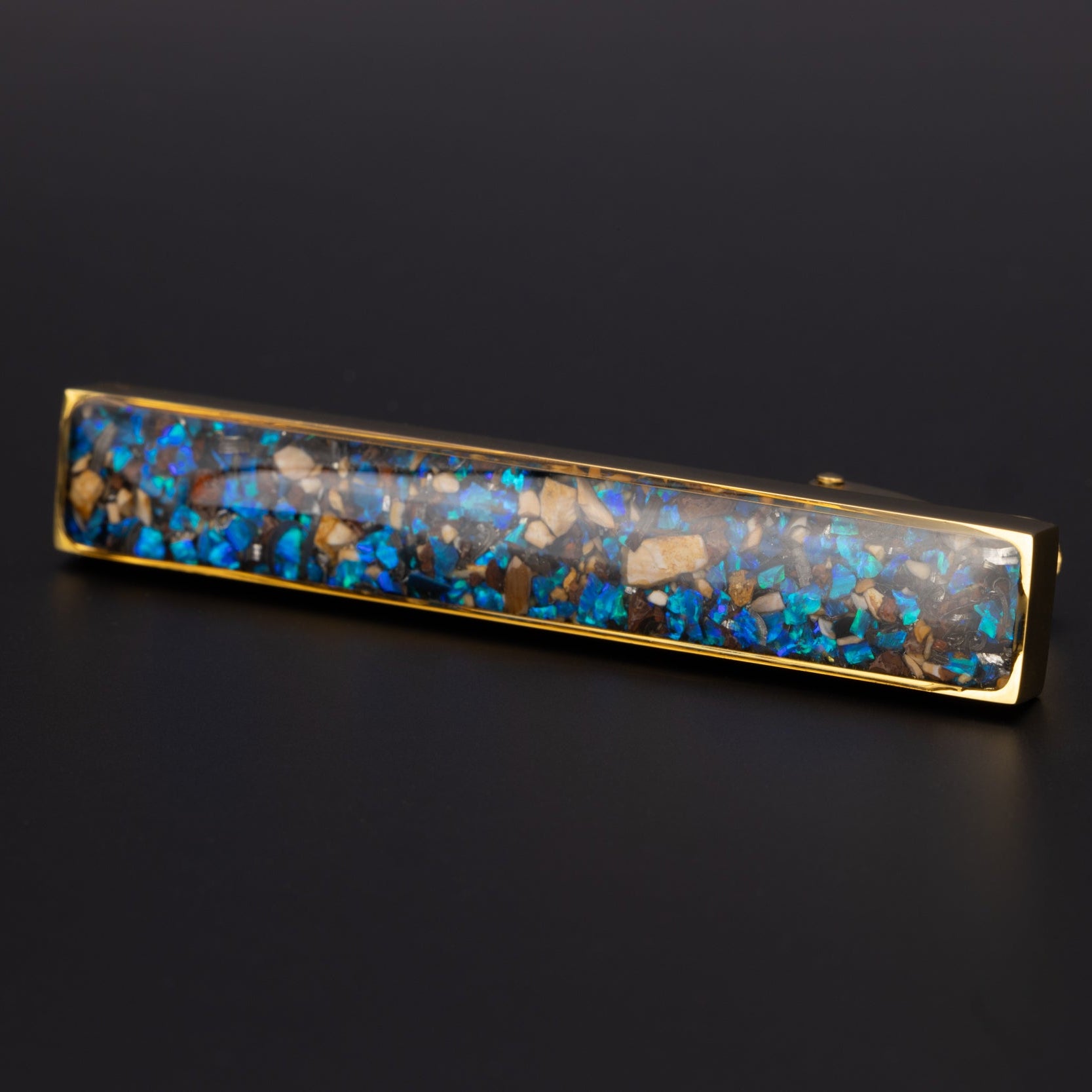 Dinosaur Meteorite Tie Clip authentic gold-tone stainless steel mens tie clip with Campo Del Cielo meteorite, real dinosaur bone, crushed dinosaur gembone, and blue opal inlay