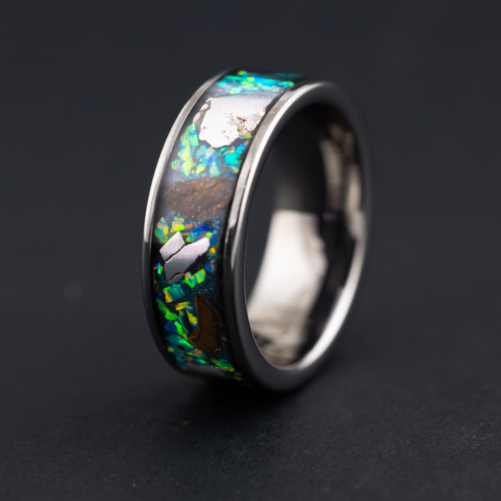 8mm wide channel tungsten ring with large pieces of authentic Triceratops bone and Campo del Cielo meteorite in green opal inlay