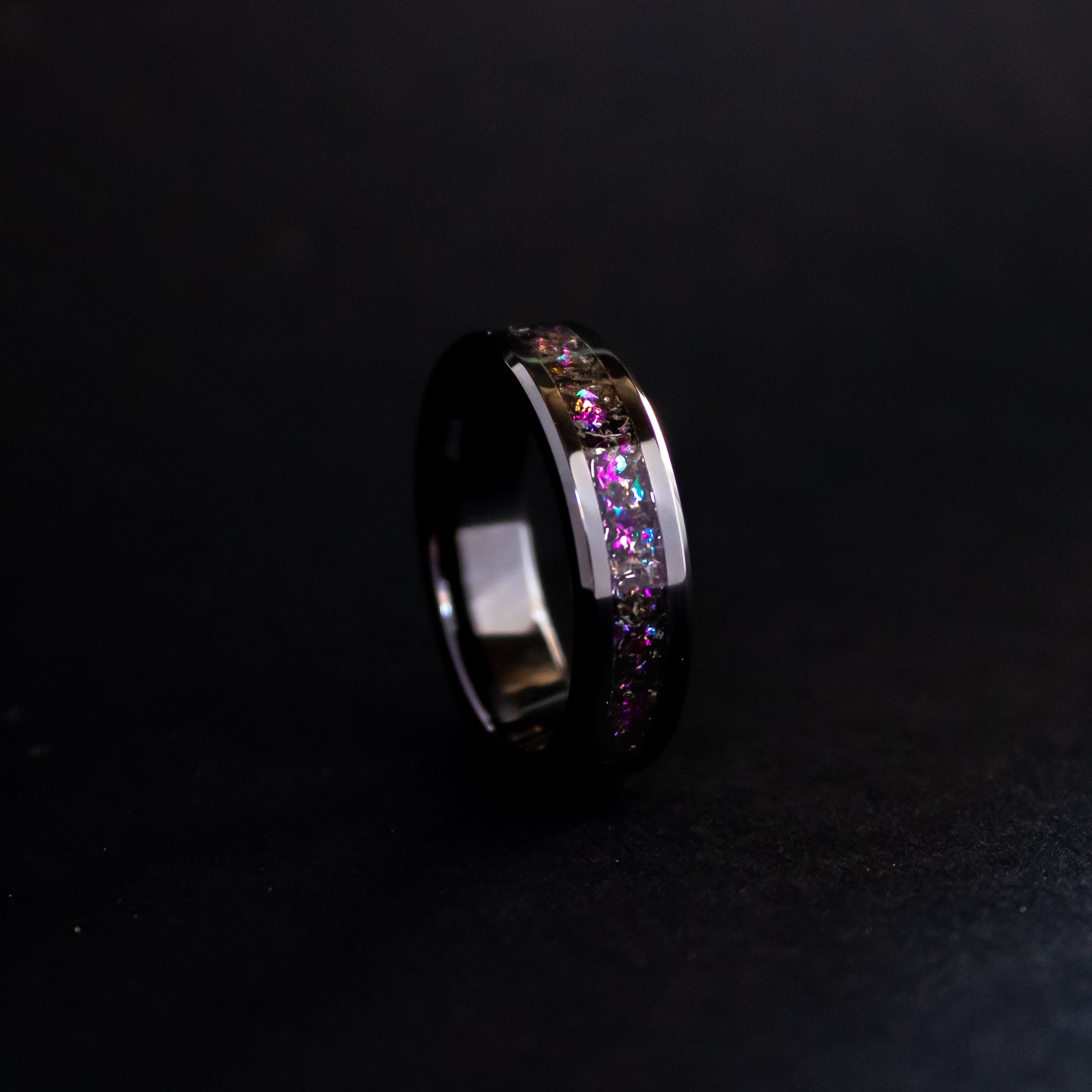 6mm beveled black ceramic ring with authentic Gibeon meteorite shavings in pink and purple galaxy glitter inlay