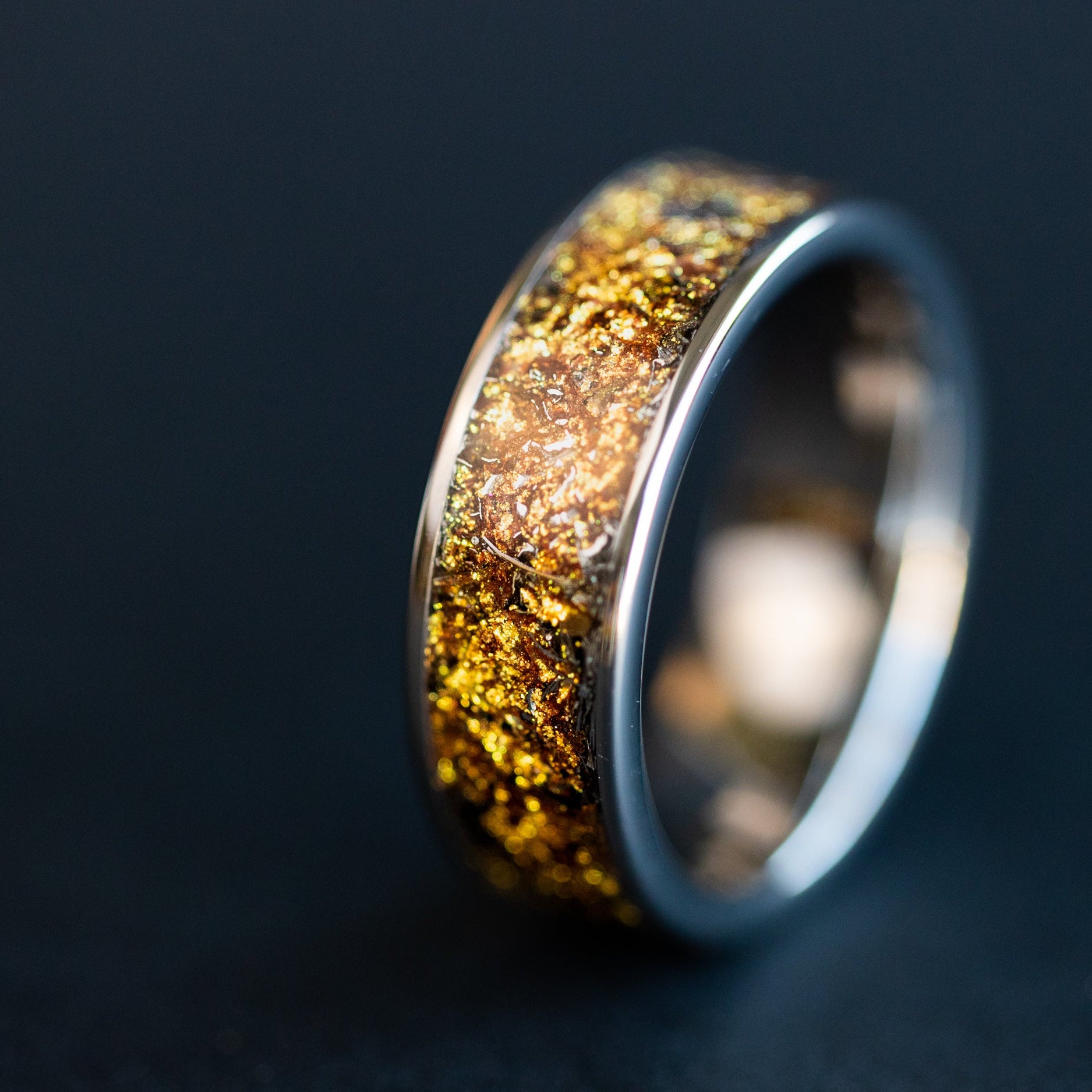 8mm wide channel tungsten ring with authentic Campo del Cielo meteorite shavings suspended in gold galaxy pigment inlay