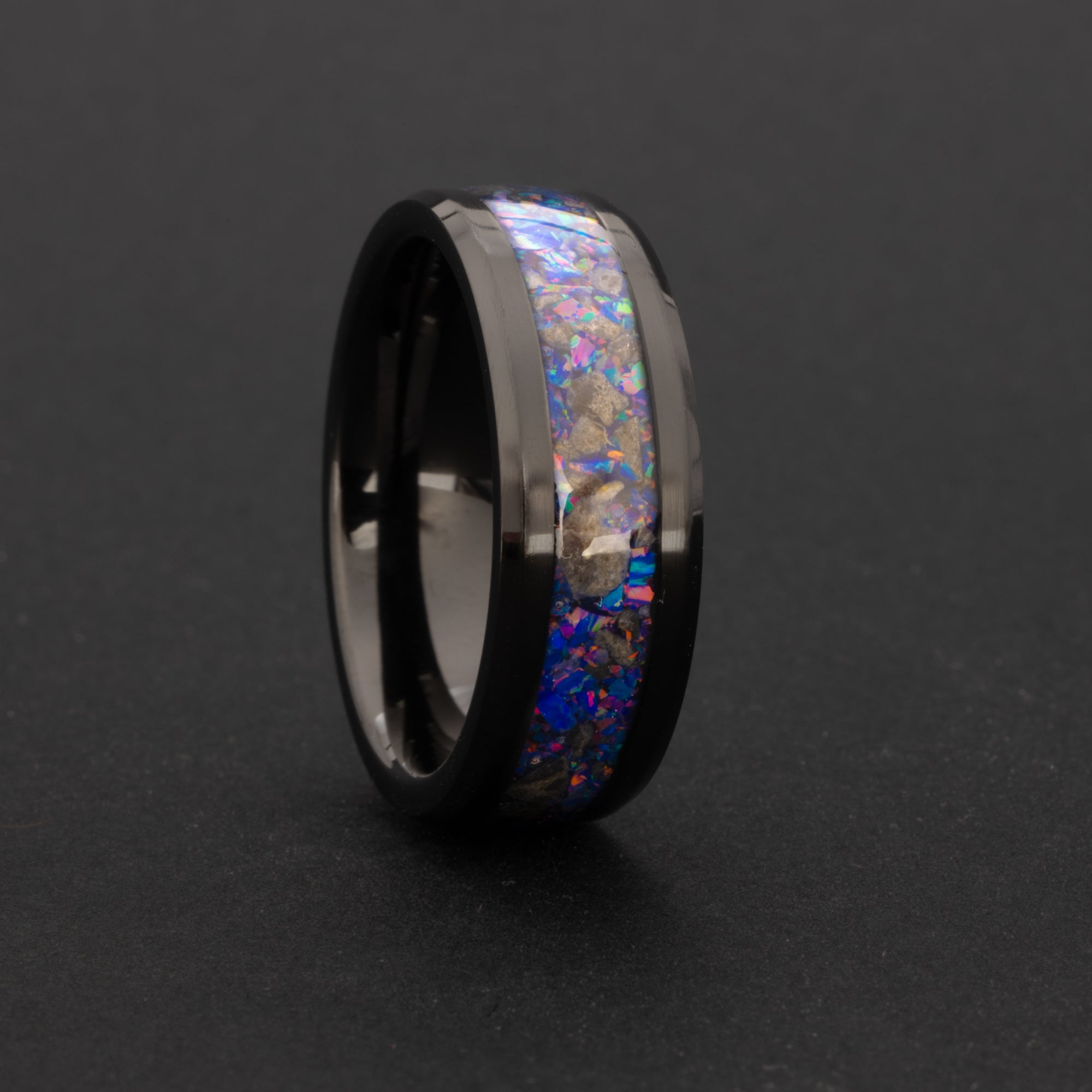 Lunar Midnight Ceramic 8mm beveled black ceramic mens wedding band with real lunar meteorite and proprietary purple blue Midnight Opal inlay