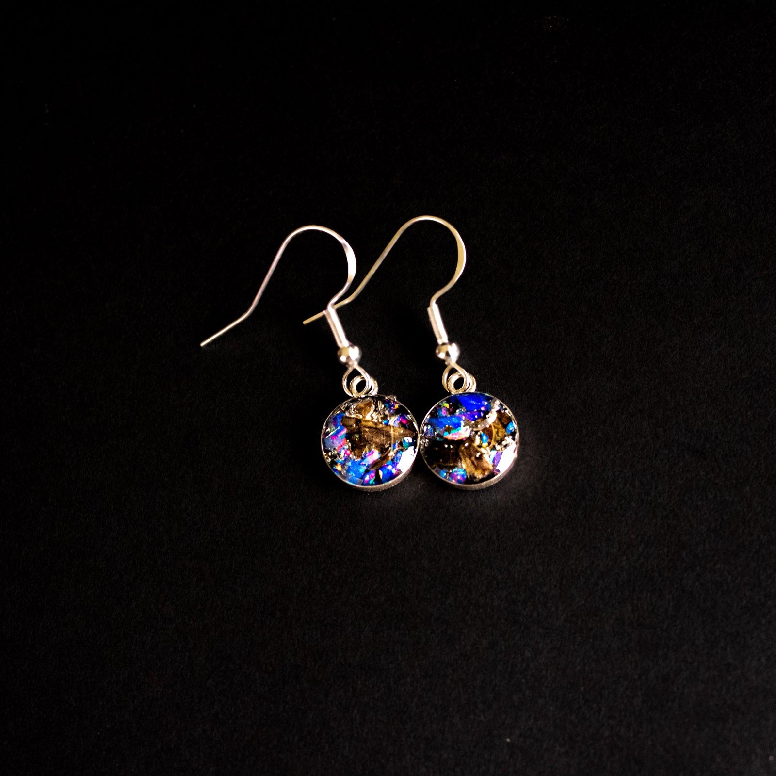 Midnight TRex Dangle authentic silver dangle earrings with Campo Del Cielo meteorite, real T-Rex fossil bone, and Midnight Opal inlay