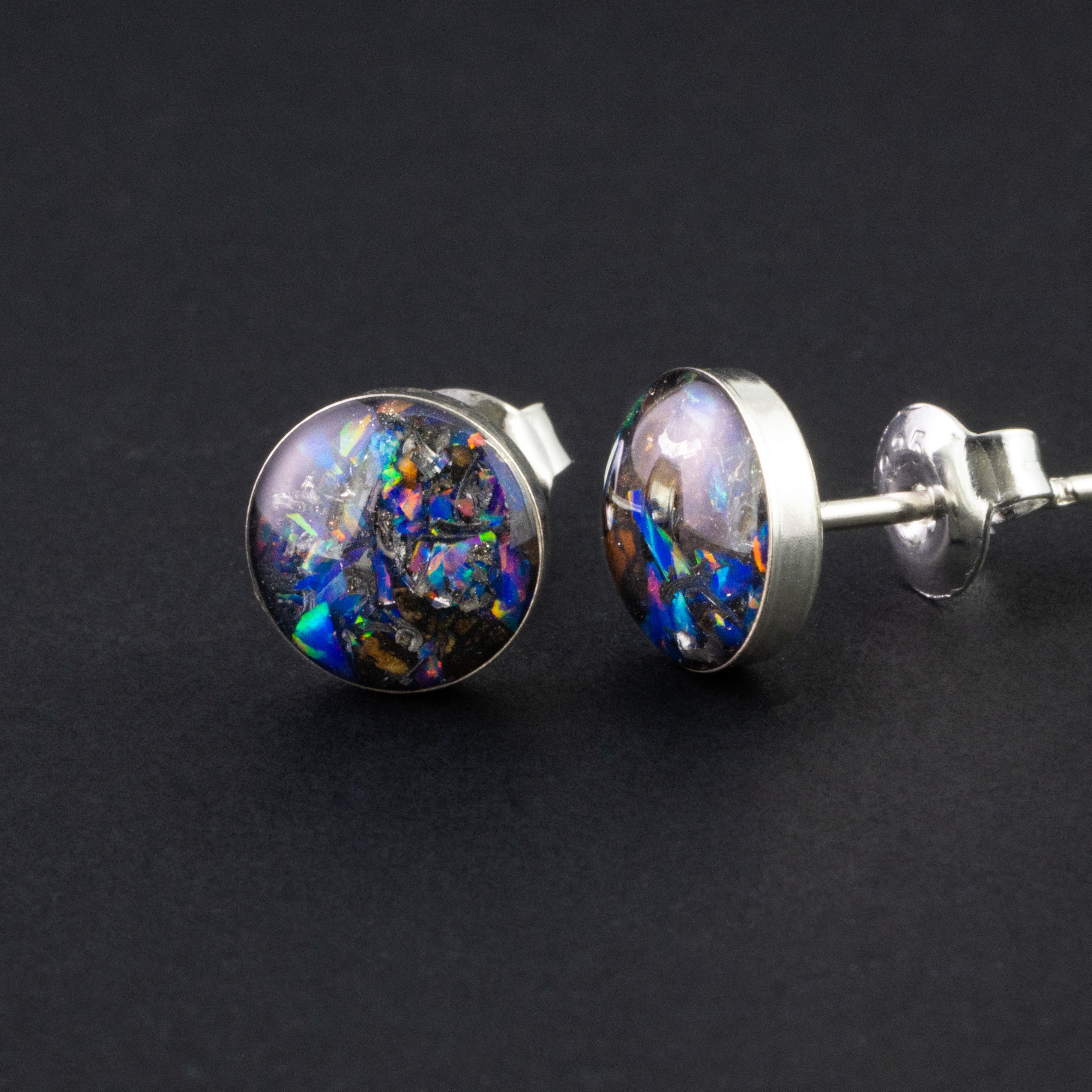 Midnight TRex Studs authentic silver stud earrings with Campo Del Cielo meteorite, real T-Rex fossil bone, and Midnight Opal inlay