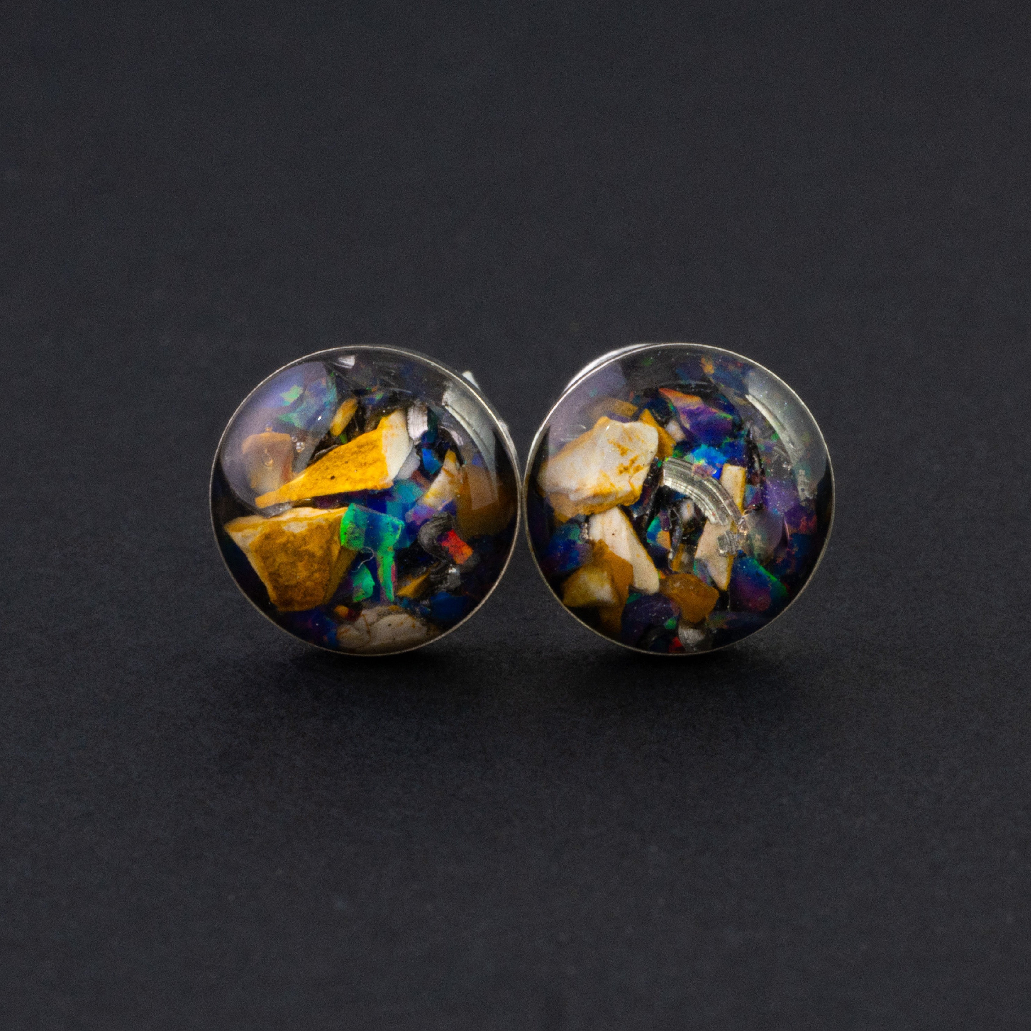 Midnight Velociraptor Stud authentic silver stud earrings with Campo Del Cielo meteorite, real velociraptor fossil bone, and Midnight Opal inlay