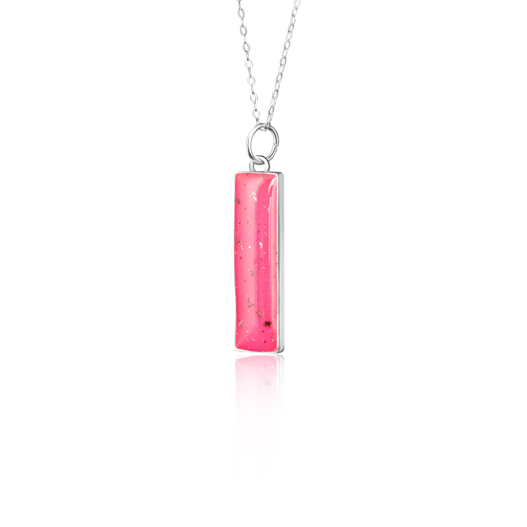 Close-up of the Pink Nova pendant showing authentic Campo Del Cielo meteorite fragments set in pink resin