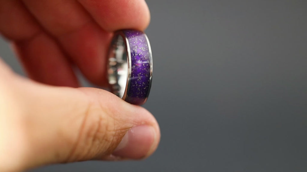 Cinematic view of the Royal Purple ring showing the Gibeon meteorite sparkle and purple resin.