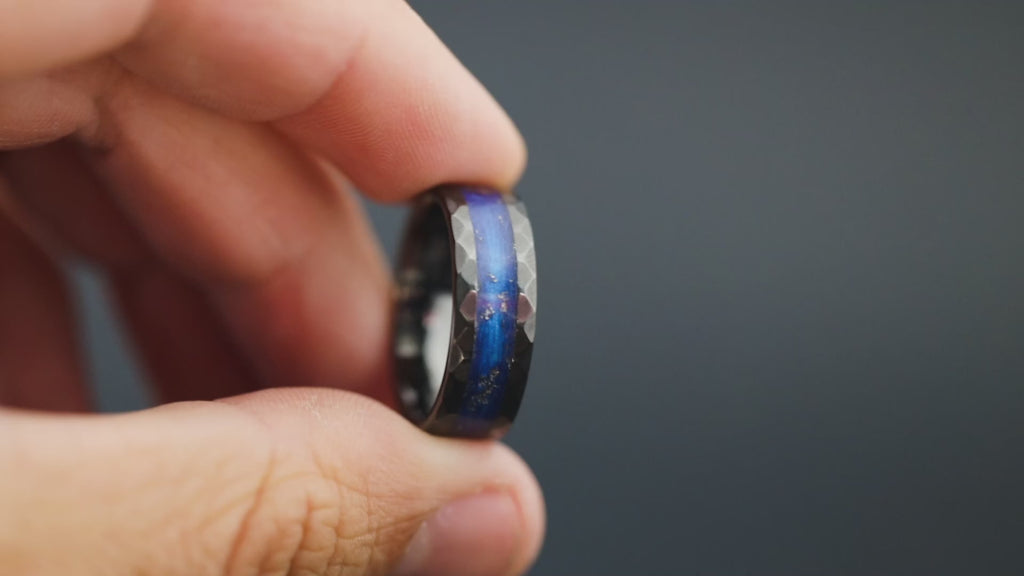 Cinematic view of the Blue Nebula Hammered ring showing the meteorite sparkle and blue resin.