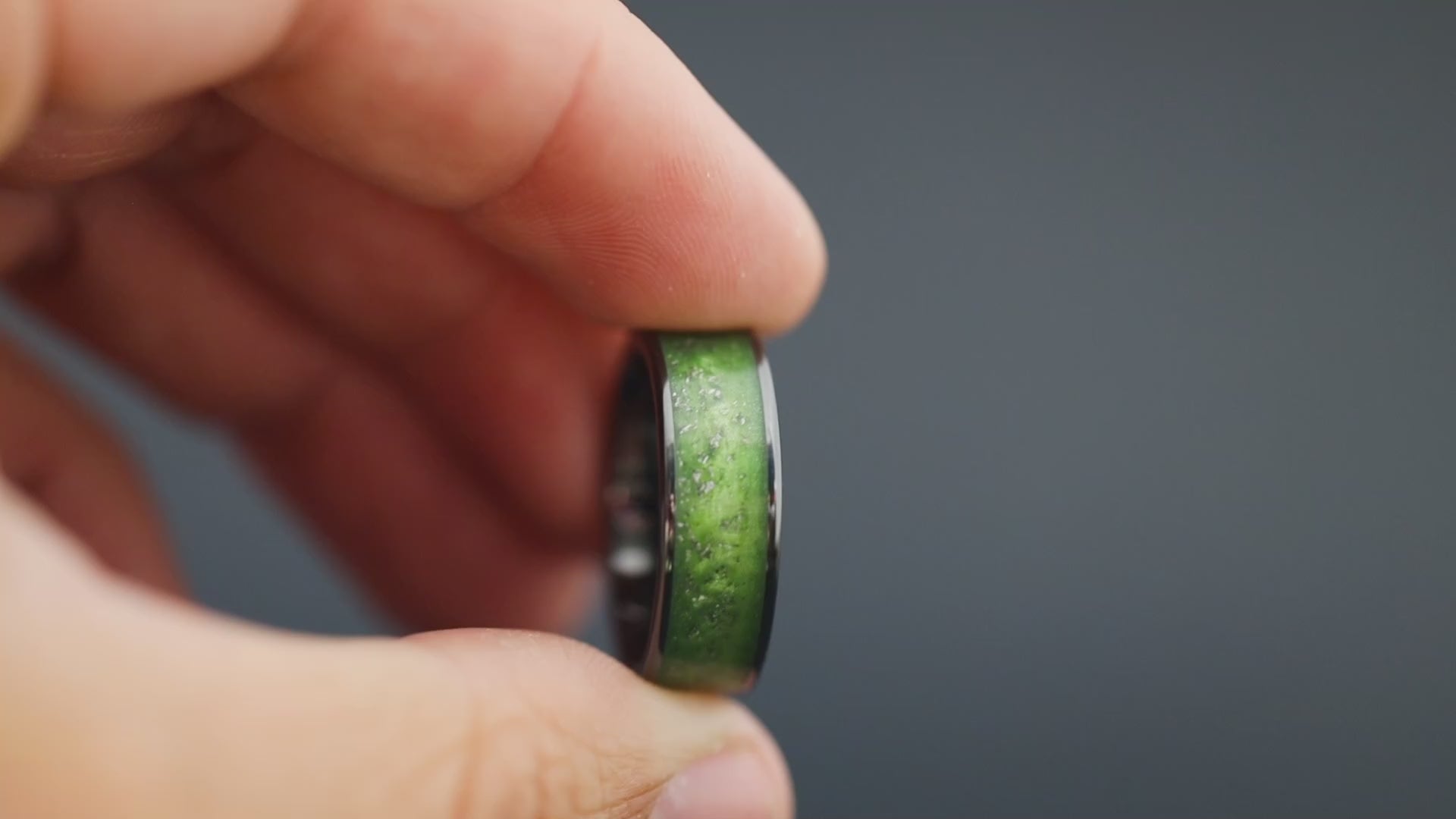 Cinematic view of the Stellar Lime ring showing the meteorite sparkle and lime green resin.