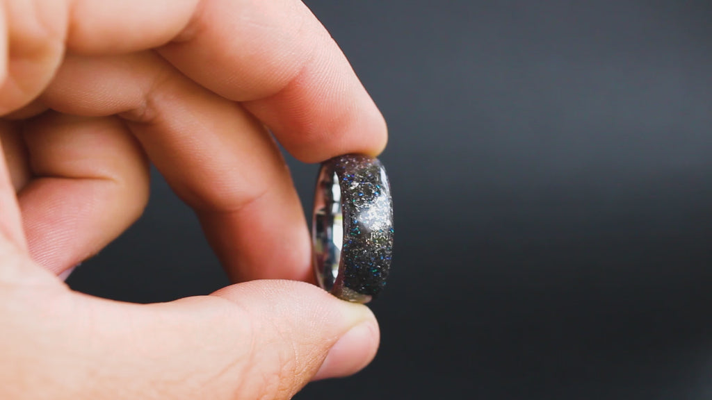 360 degree product view of the Blue Spark ring showing Campo del Cielo meteorite shavings and blue opal accents on 8mm endless tungsten band